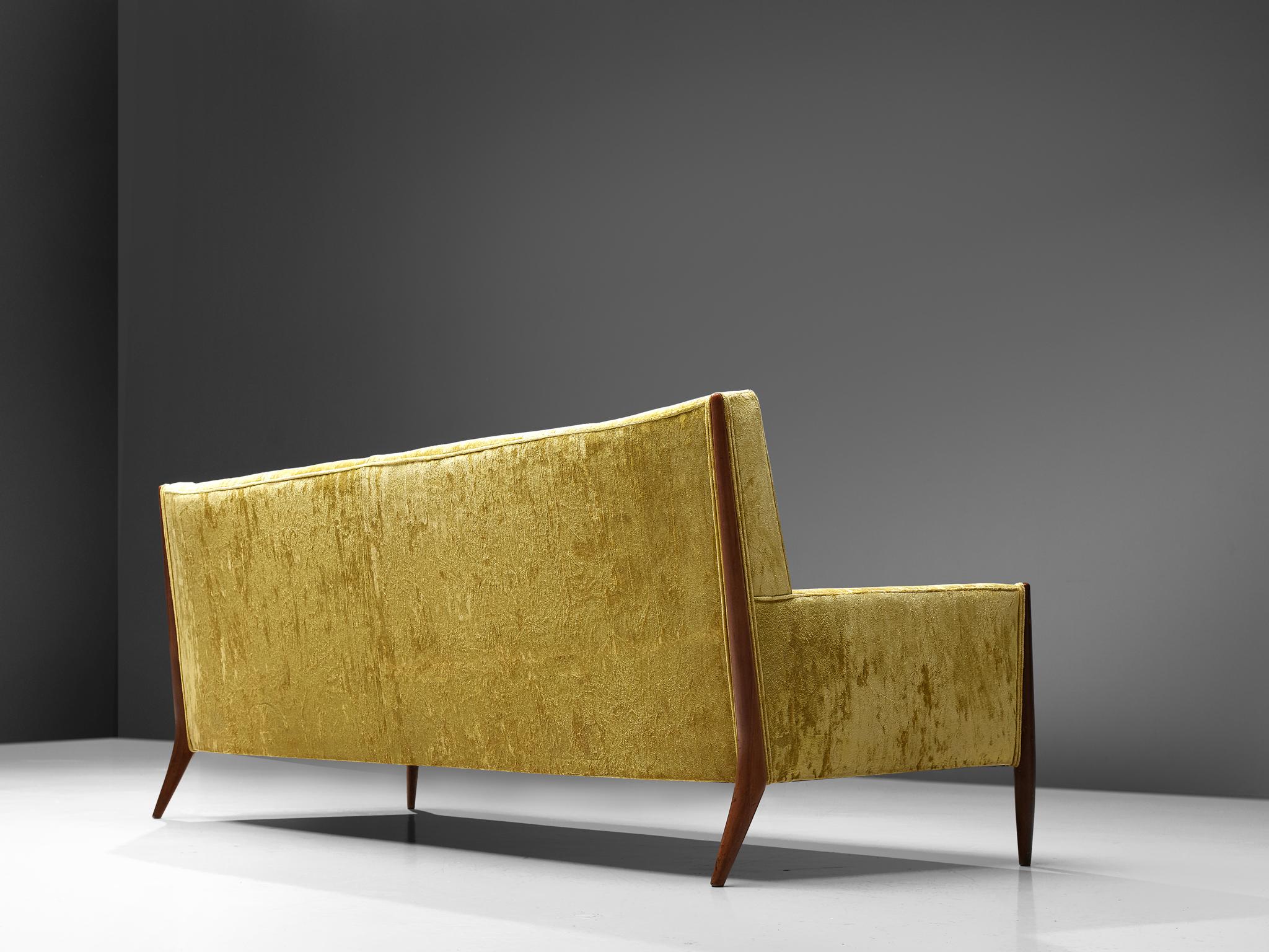gold colored sofa