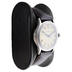 Reloj redondo Art Déco de acero Jules Jergensen con esfera original circa 1940's