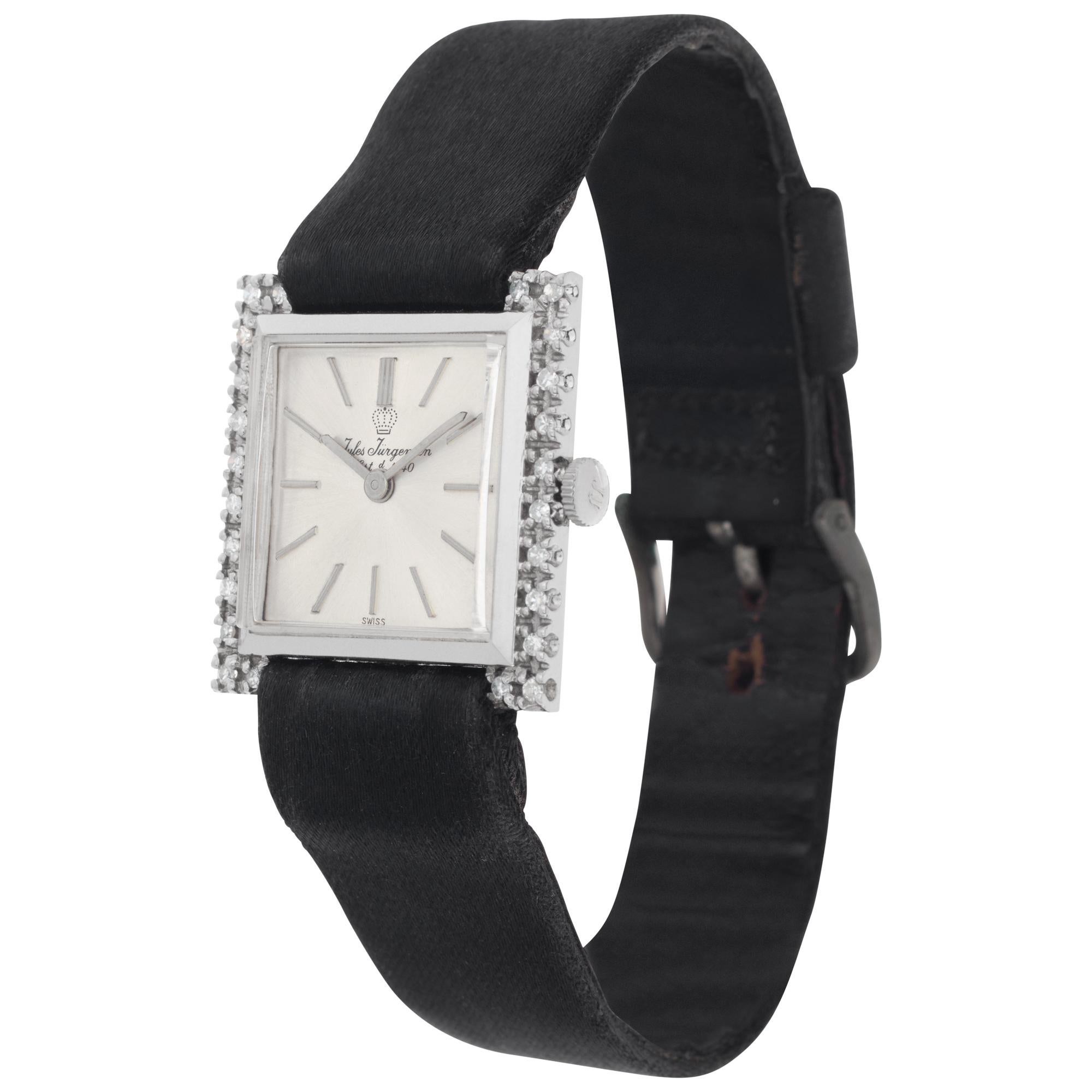 Vintage Jules Jurgensen Classic in 14k white gold with diamond case on a satin strap. Comes with original JJ crown. Manual. Case size 25.5mm. Ref 685415. Circa 1960s Fine Pre-owned Jules Jurgensen Watch.

Certified preowned Vintage Jules Jurgensen