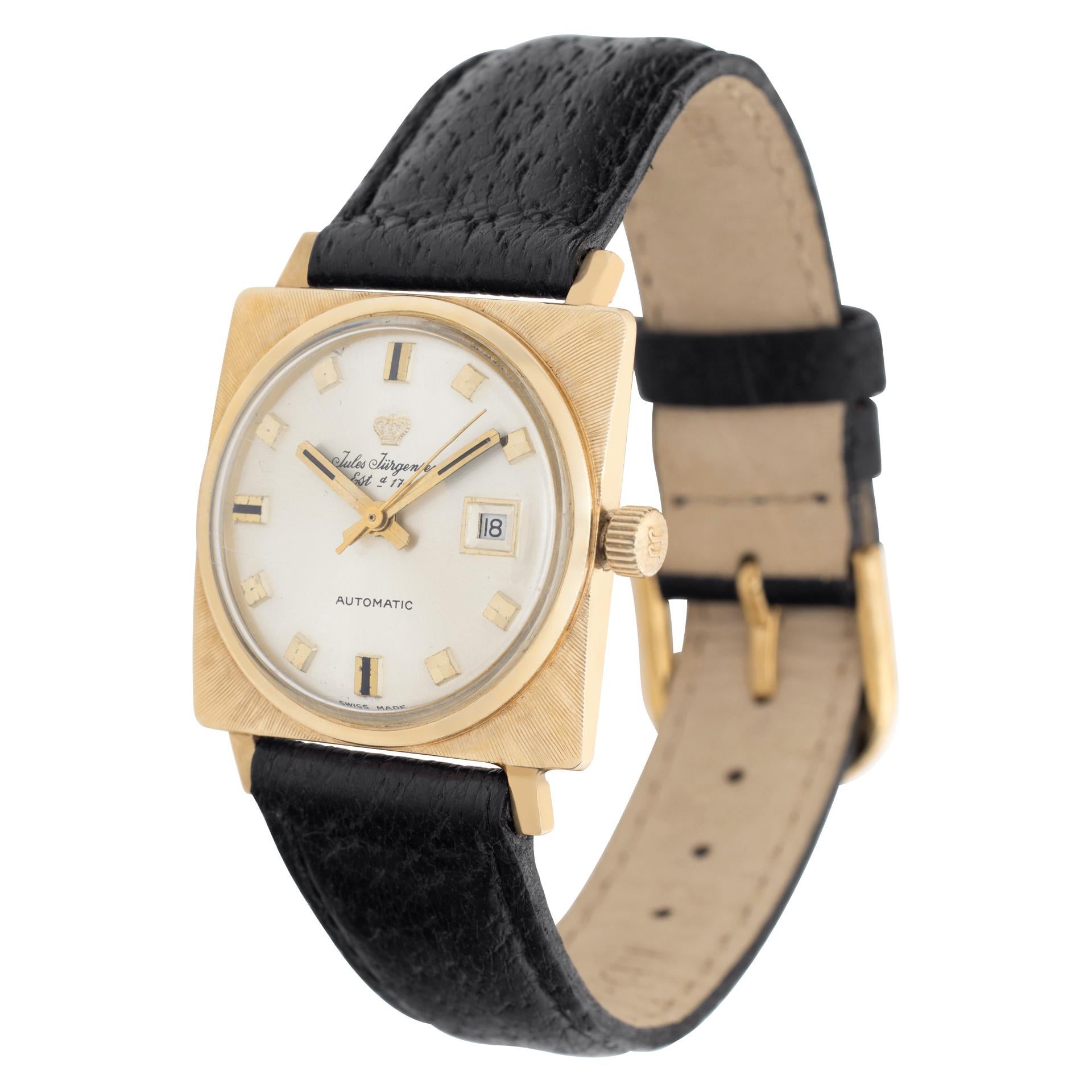 Vintage Jules Jurgensen with square 14k yellow gold case, 14k bezel, leather black band with two piece clasp. Manual wind. Fine Pre-owned Jules Jurgensen Watch. Certified preowned Vintage Jules Jurgensen Classic watch is made out of yellow gold on a