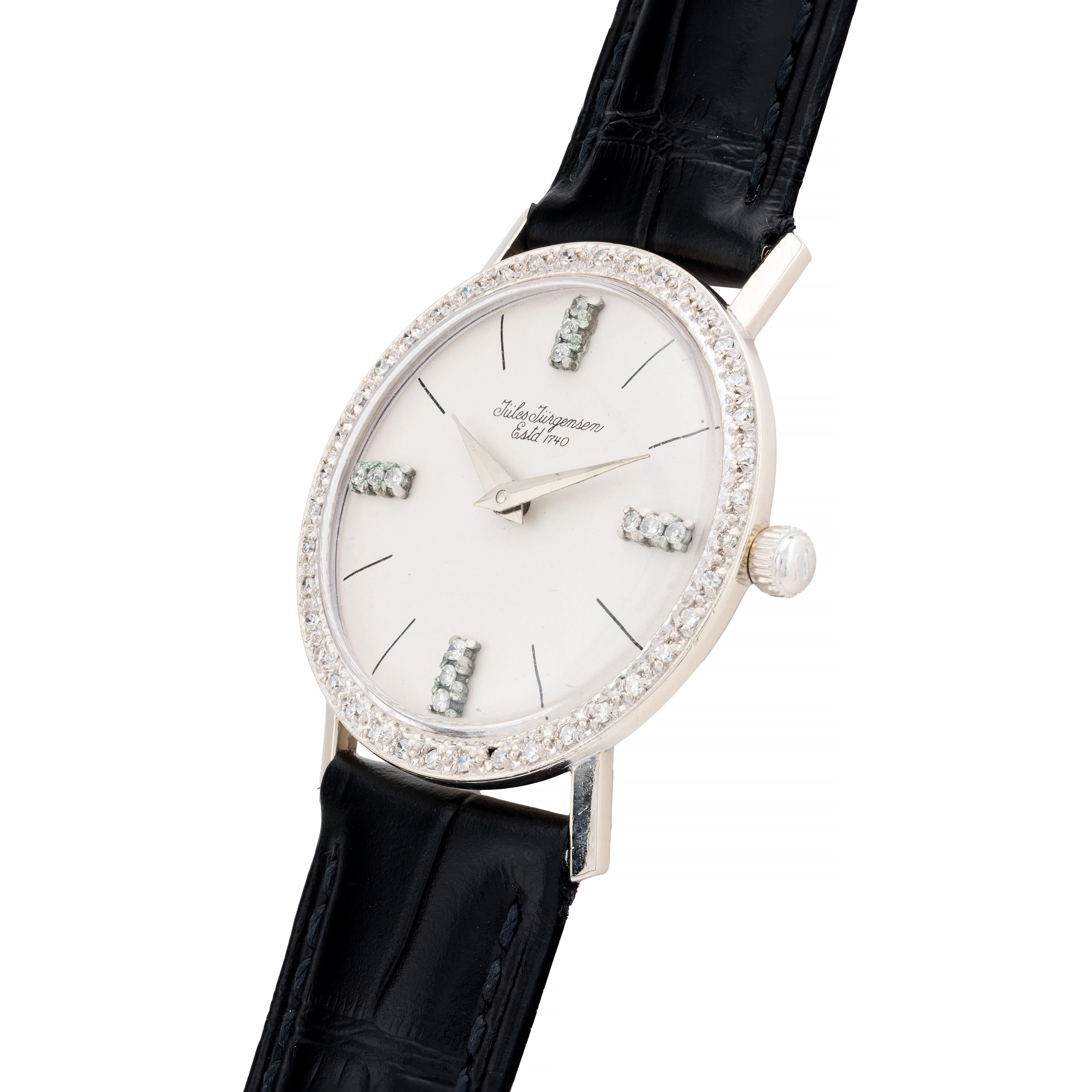 Aston Estate Jewelry Presents:

A refined Jules Jurgensen wristwatch from 1960, crafted in Switzerland. This timepiece showcases Jules Jurgensen's dedication to elegance and precision.

The watch features a round 33mm face, encased in 14k white gold