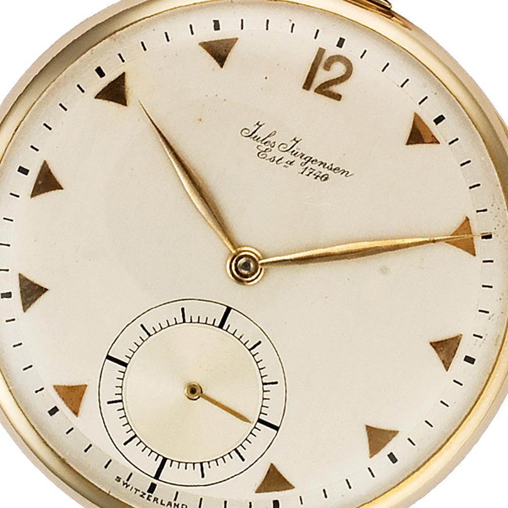 Presentation Jules Jurgensen open face pocket watch in 14k with fob chain and knife. Manual w/ subseconds. Ref t042260. Circa 1939. Fine Pre-owned Jules Jurgensen Watch.   Certified preowned Jules Jurgensen pocket watch watch is made out of yellow