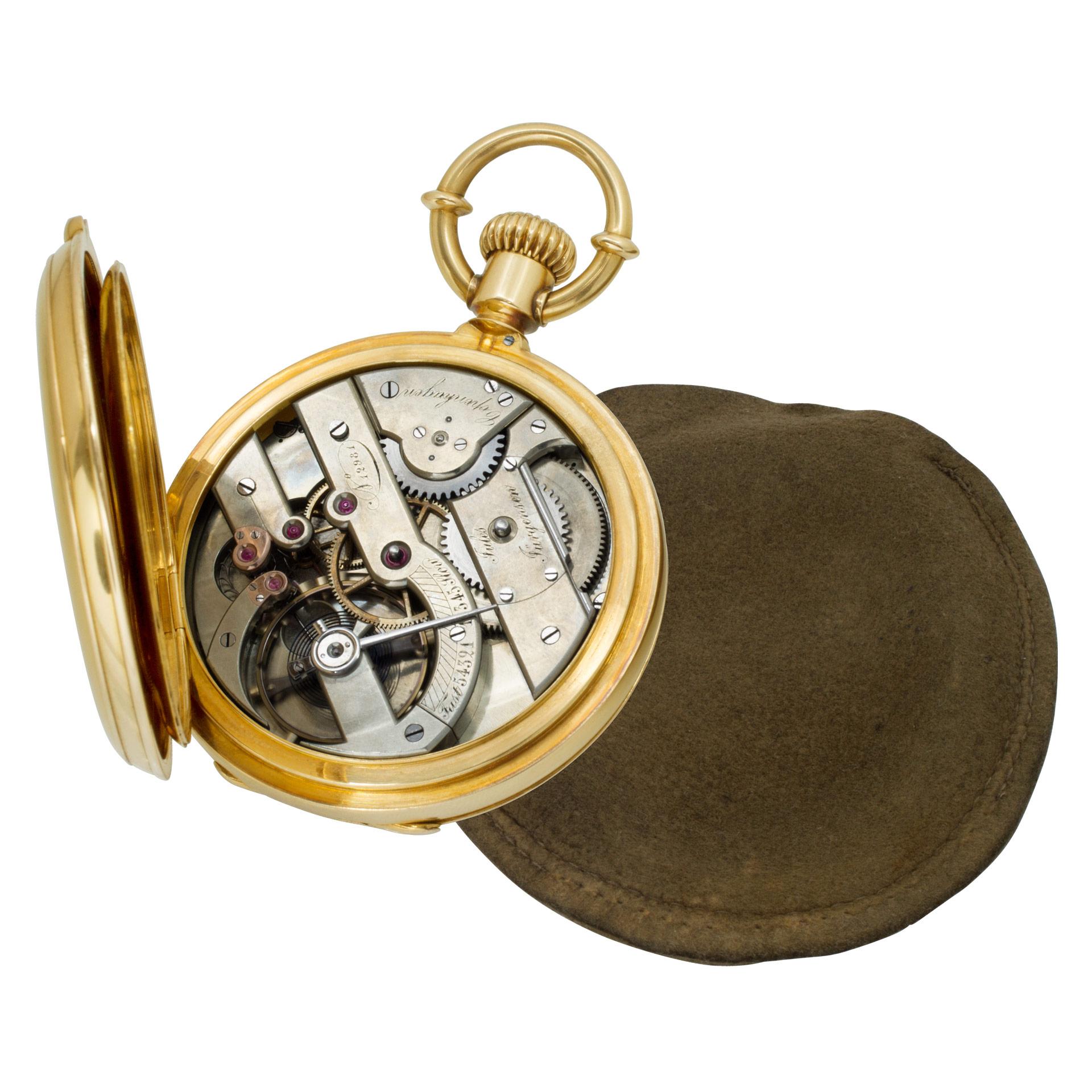 Jules Jurgensen hunter case pocket watch with porcelain dial and moon hands in 18k yellow gold . Barley corn engine turned front and back lid. Manual 18 jewel movement w/ subseconds. Patented bow set. 54.5mm case size. Circa 1890s. Fine Pre-owned