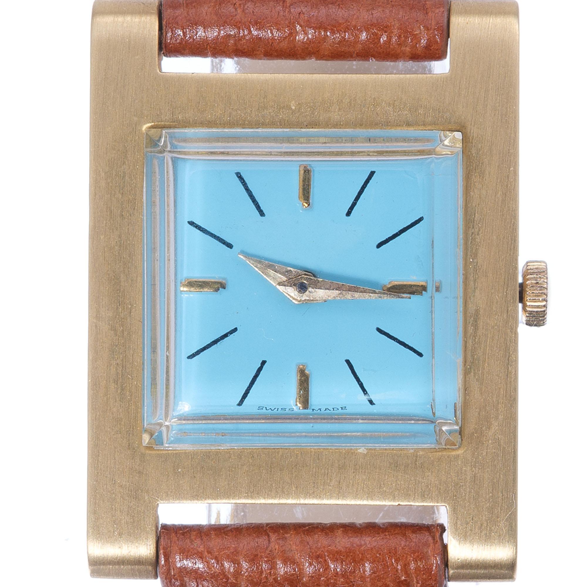 1950’s 18k yellow gold Swiss Jules Jurgensen wristwatch with original dial refinished and custom colored a bright Robin’s egg Turquoise blue. While originally a man’s watch this is perfect for a woman’s wrist. “H: design case.

18k yellow gold
13.2
