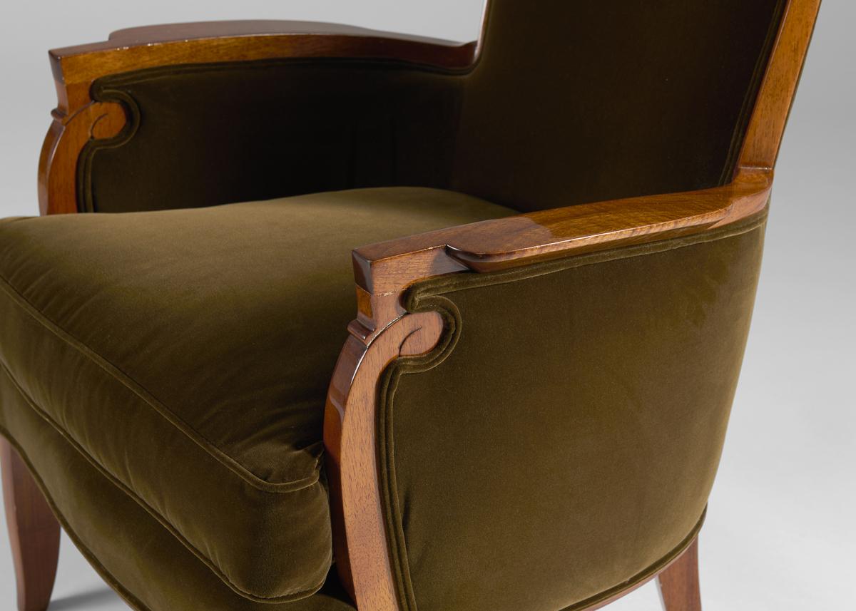 With rounded and scrolled detail on the armrest, this Jules Leleu Art Deco armchair is the picture of elegance and comfort. 

Bibliography:
For an illustration of a similar model, see :
Jutheau, Viviane. Jules et Andre Leleu. Paris : Editions