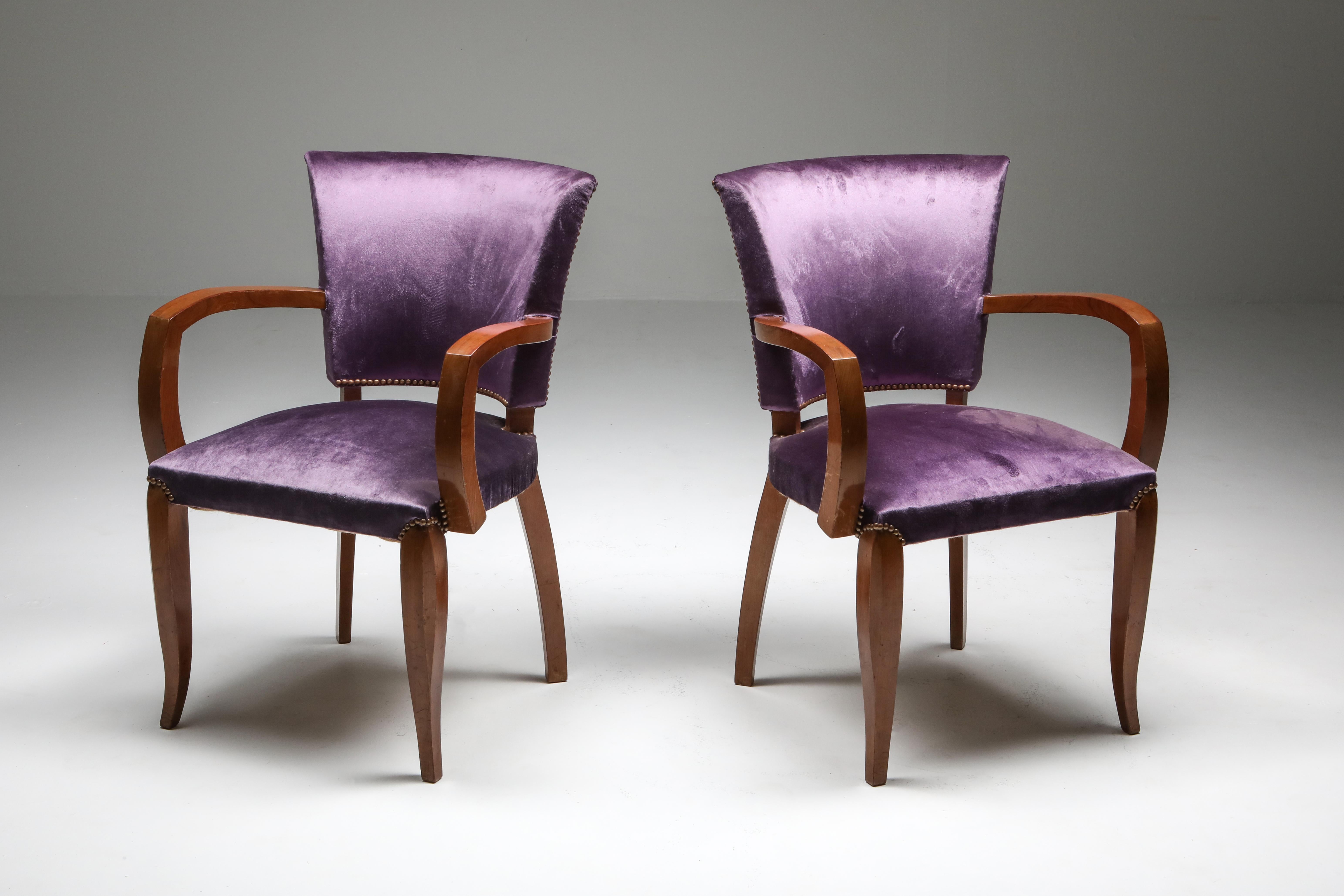 Art Deco armchairs, style Jules Leleu, France, 1940s
A solid mahogany frame and lilac velvet upholstery make these a perfect set to be used at a desk or as corner table chairs
would fit well in a Jean-Charles Moreux, Ruhlmann, Arbus or Jean Royère