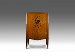 Armario Art Decó Jules Leleu con marquetería floral en ébano y nácar.