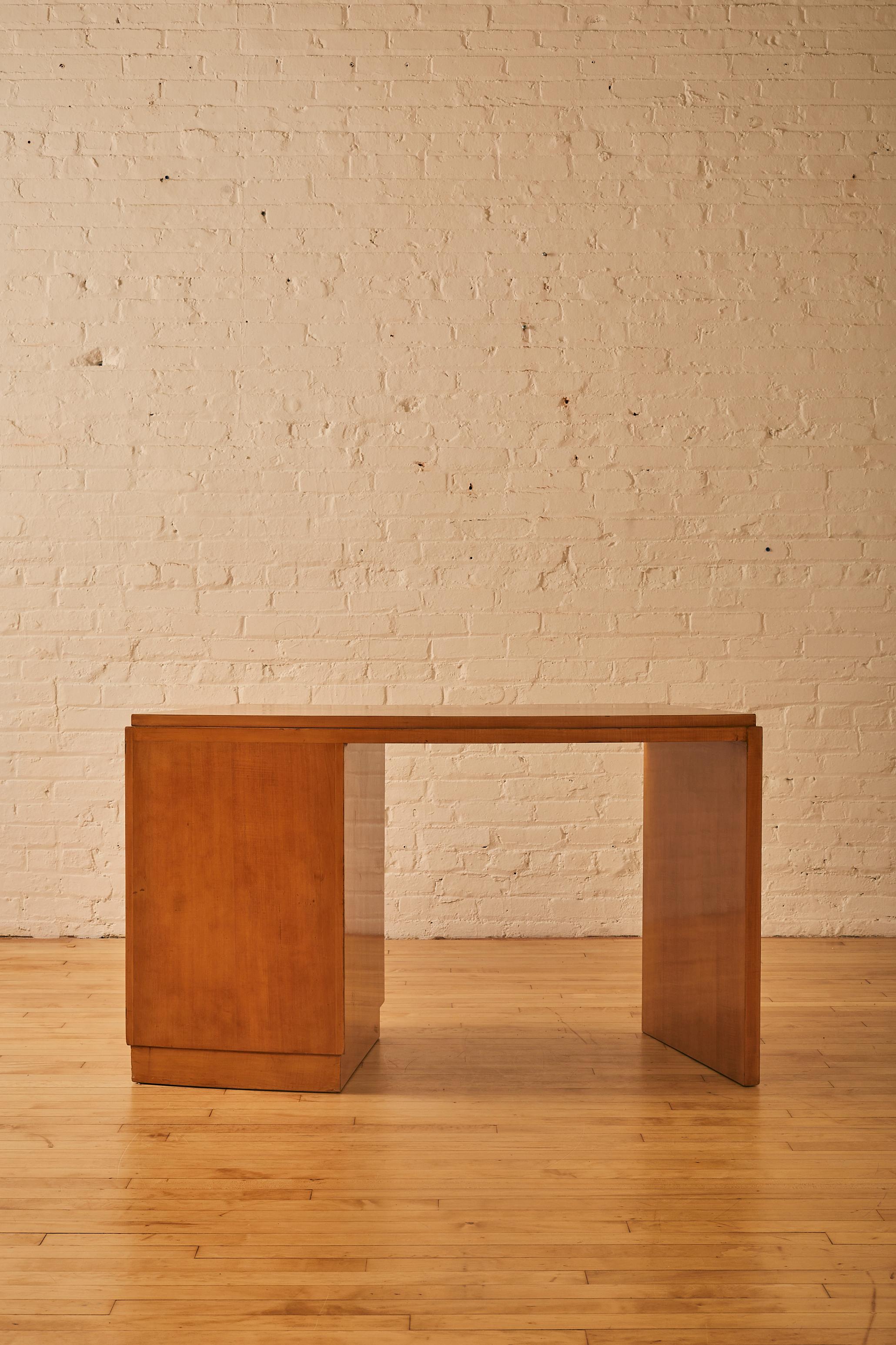 Semi circular birch wood desk by Jules Leleu

About Jules Leleu: 

Jules Leleu (1883 - 1961) a French designer and ensemblier, Jules Leleu was one of the key authors of the Art Deco movement. While he did not win the fame of such contemporaries