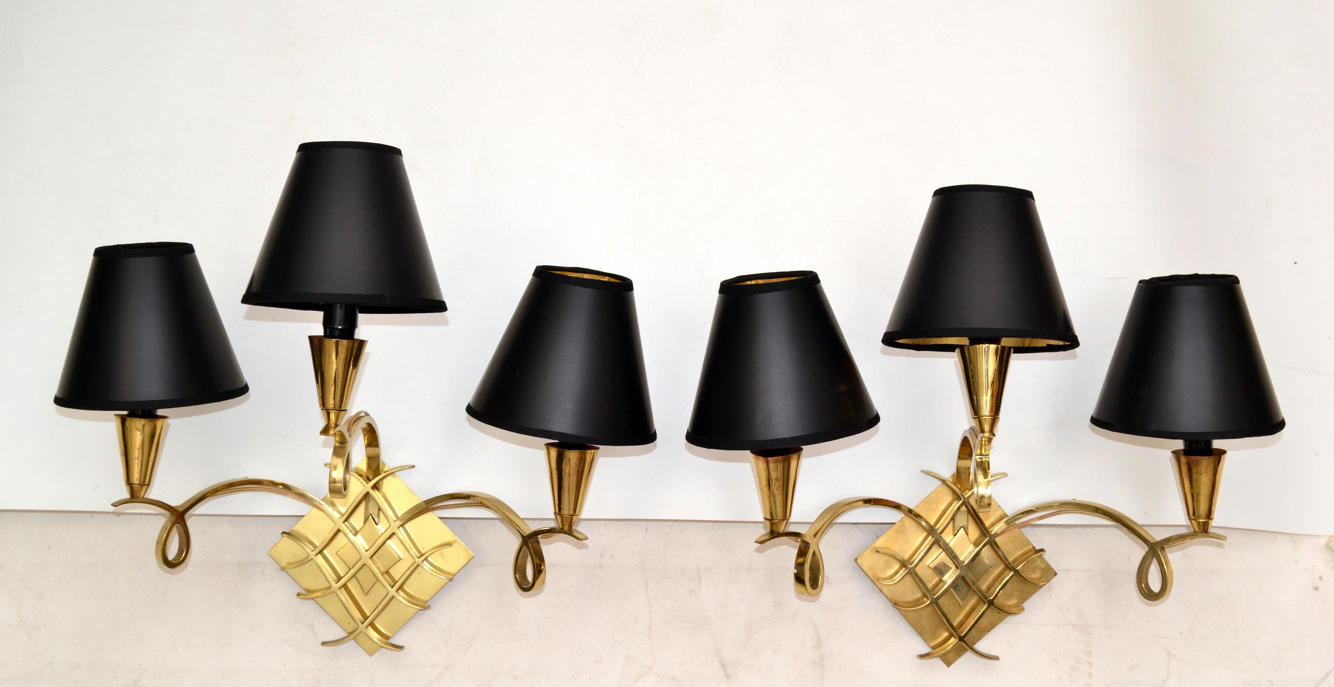 Superb pair of bronze sconces, 3 arms, 3 lights, black & gold paper shades. 
US rewired and in working condition each sconce takes 3 light bulbs with max. 40 watts.
Back plate dimension 5 by 5 inches.
Black & gold Shades measures: 
Top Diameter: