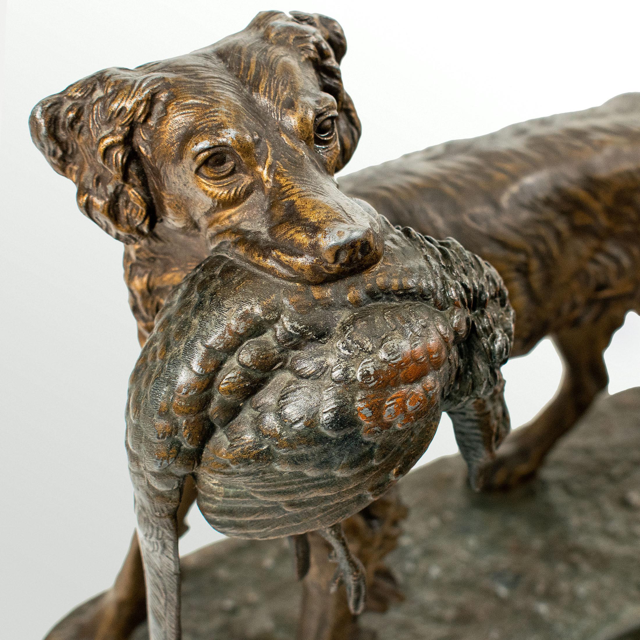Français Jules MOIGNIEZ (1835-1894) - Grande statue d'un chien de chasse tenant un fauconnier en vente