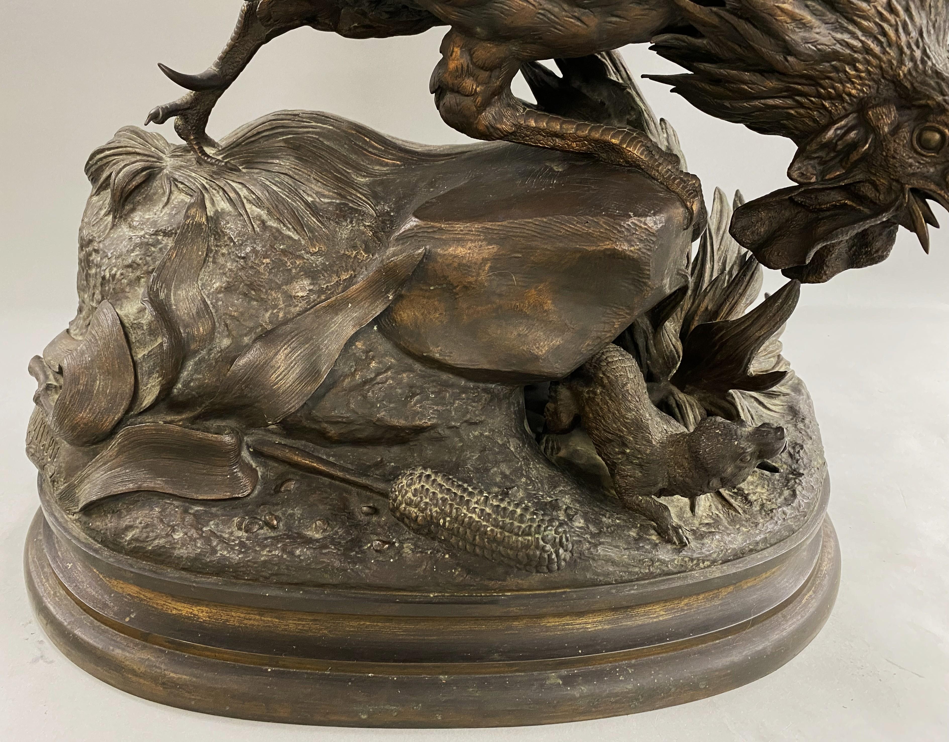 A monumental 19th century patinated animalier cast bronze of a rooster & ermine (weasel), with varying titles including 