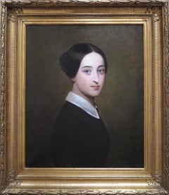 Portrait of young woman with blue eyes