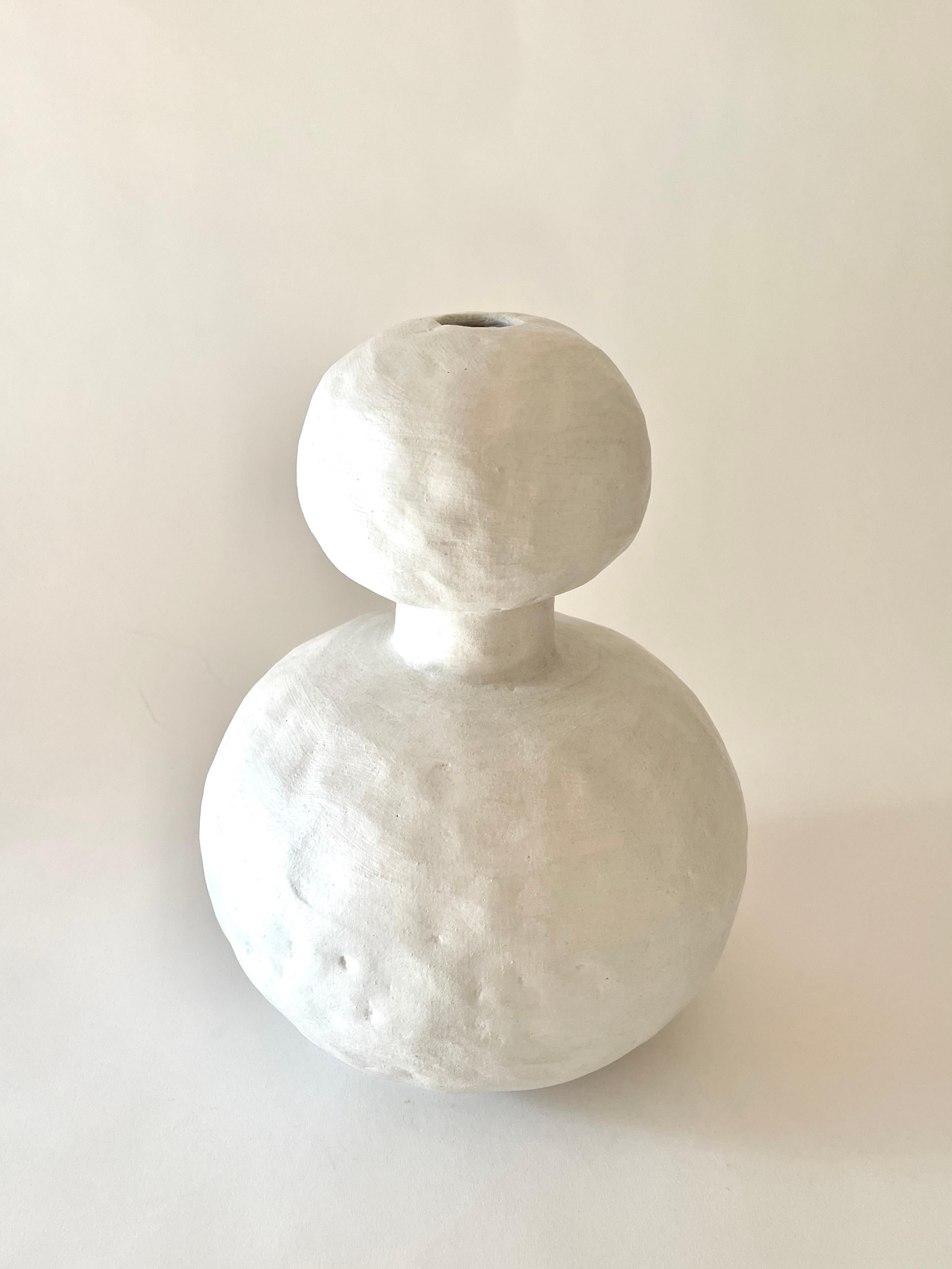 Jules White vase by Meg Morrison
Materials: Ceramic.
Dimensions: Ø 23 x H 32 cm.

Available in Black, White, Yellow and Pink finishes. All sizes are approximate. Although vases are watertight condensation may form on the bottom. Please protect