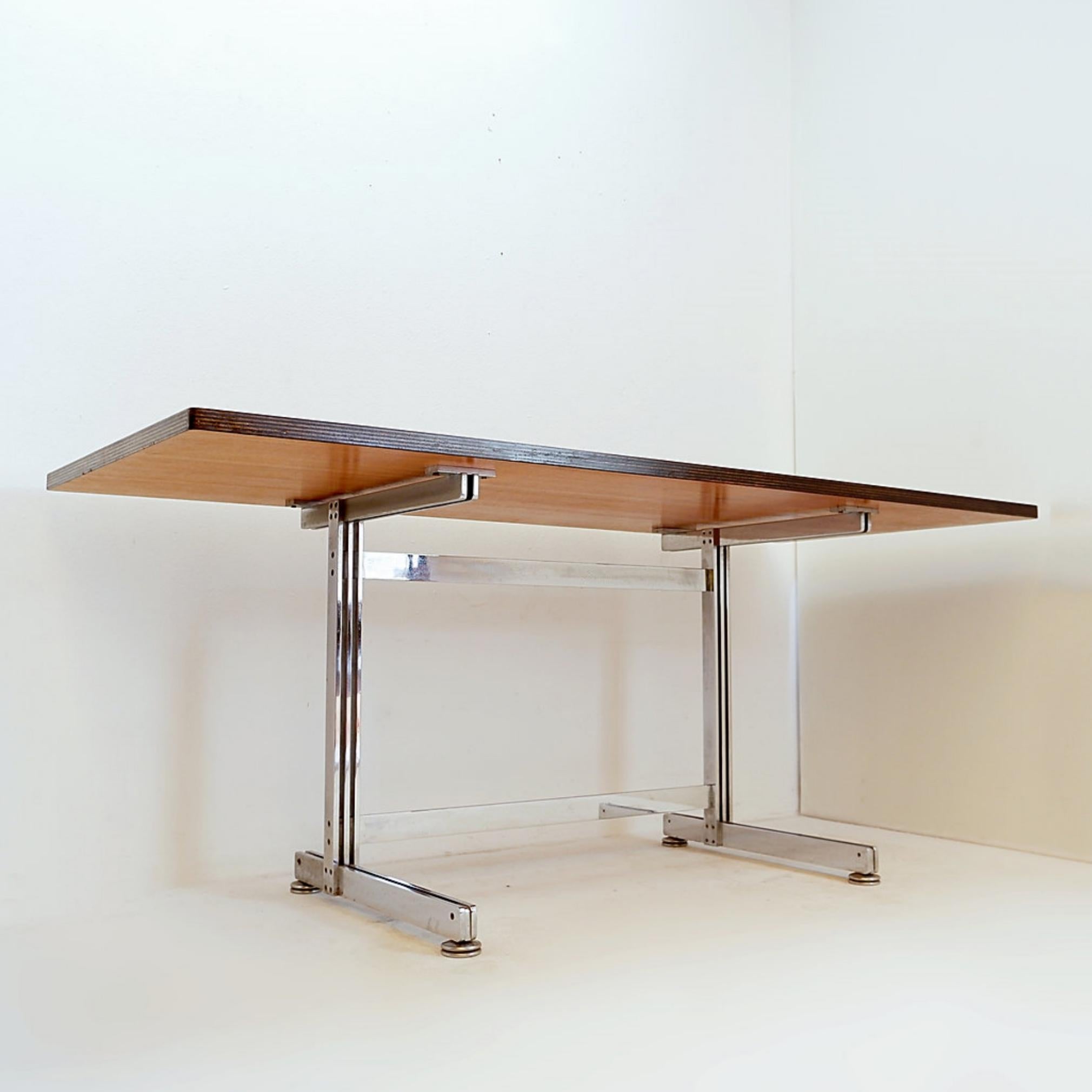 Executive desk - Belgium design - 1960s
Kinnarps mobile Drawer units sold separately.
L 180 cm x D 76 cm x H 75 cm. Table thickness 3 cm.
Weight :  ~ 70kg
Jules Wabbes desk, laminated wood top and asymmetrical structure made of double chrome-plated