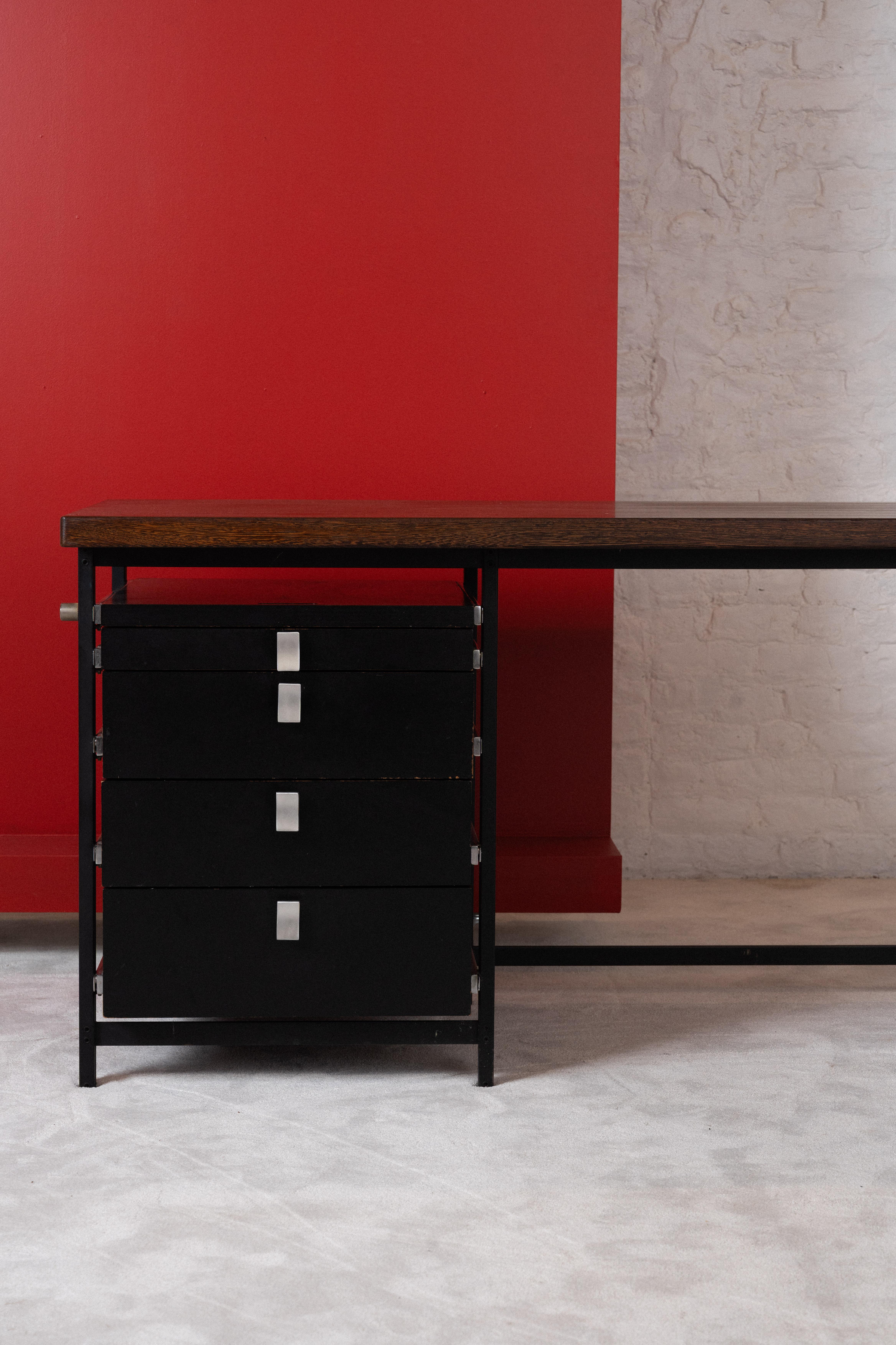 Desk designed by Jules Wabbes and manufactured by Mobilier Universel in the 1960s.
Jules Wabbes (1919–1974) was a Belgian designer famed for his timeless, functional furniture. His elegant use of wood and metal defined mid-20th-century modernist