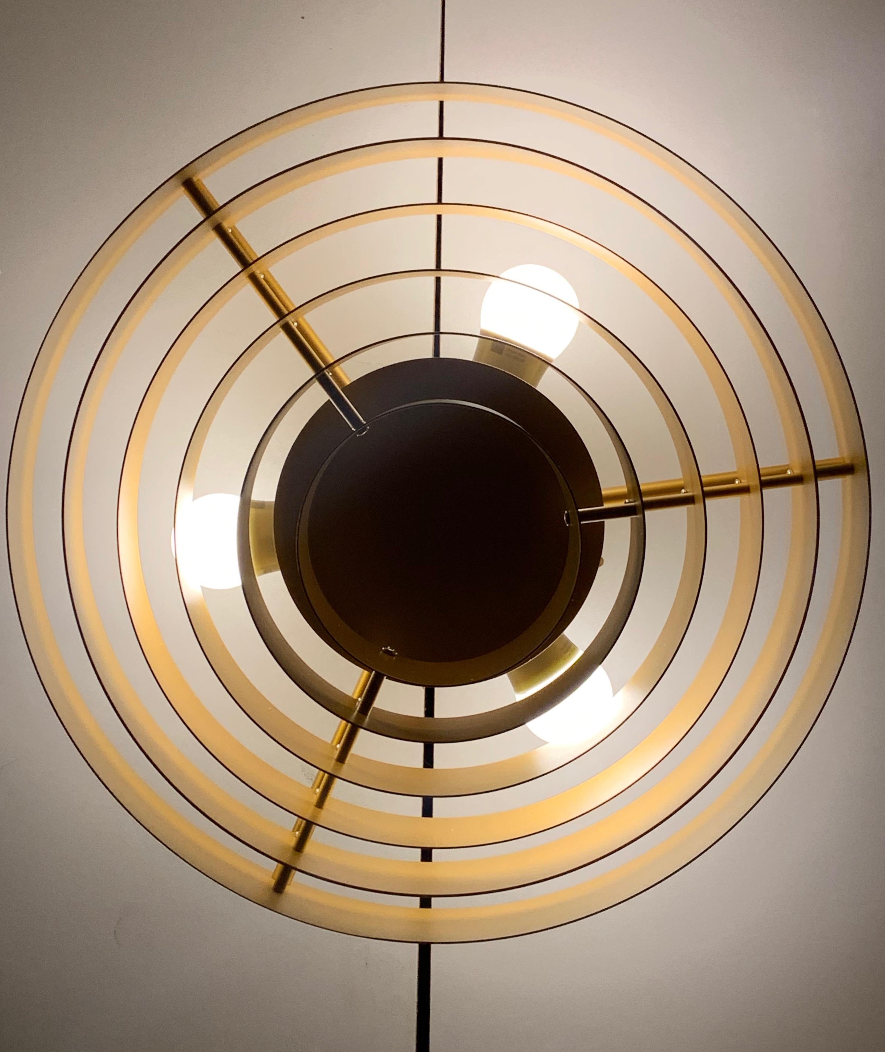 Beautiful flush mount by Belgium designer Jules Wabbes from current production. 
The gold finish provides a wonderful light. More pieces available upon order. 

Ready to use in the US & Canada 
Light source: 3 x E27 max. 53W
4 kg.