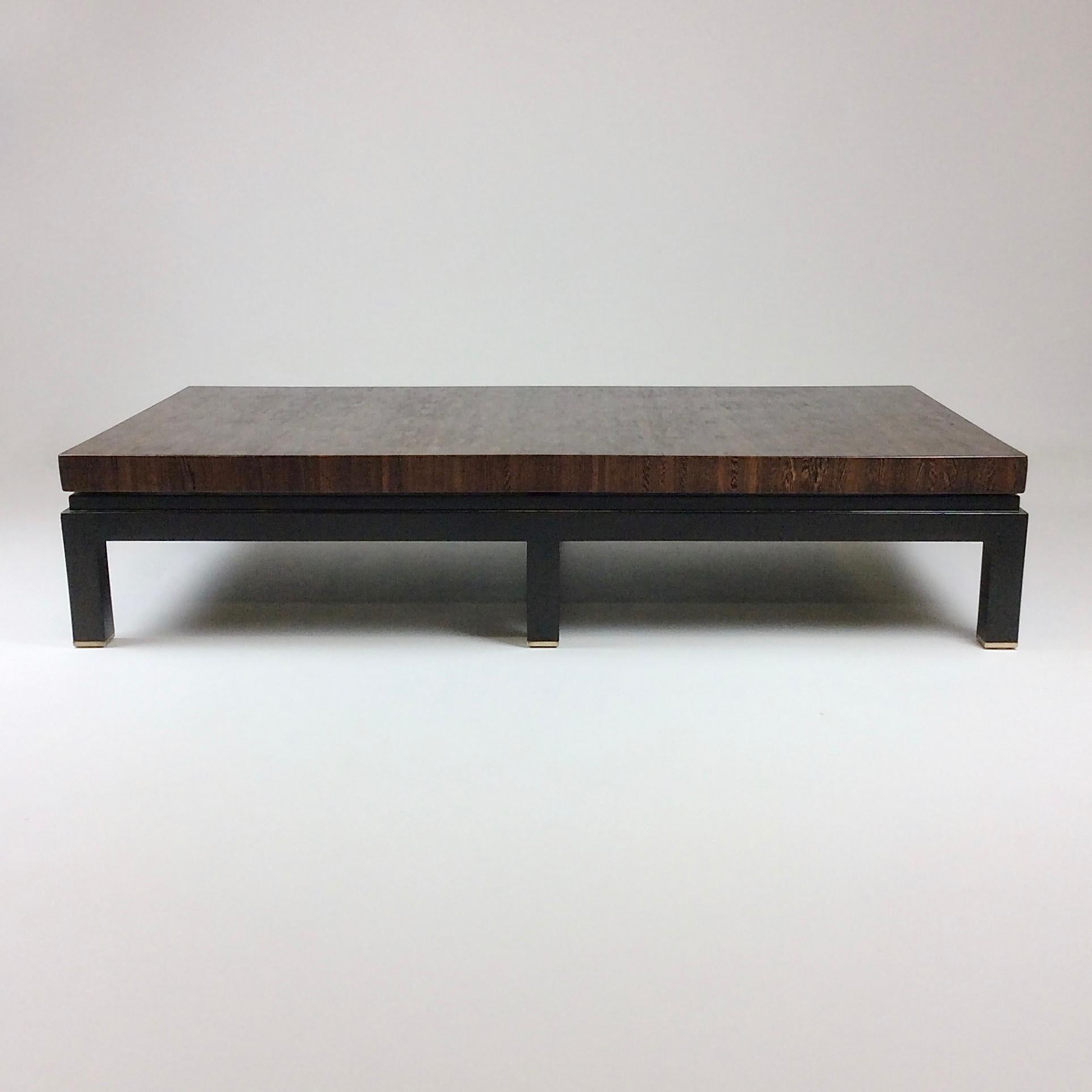 Nice large coffee table by Jules Wabbes for Le Mobilier Universel, circa 1970, Belgium.
End-grain Wenge top, blackened wood structure, brass details.
Dimensions: 150 cm W, 75 cm D, 32 cm H.
Good original condition.
All purchases are covered by our