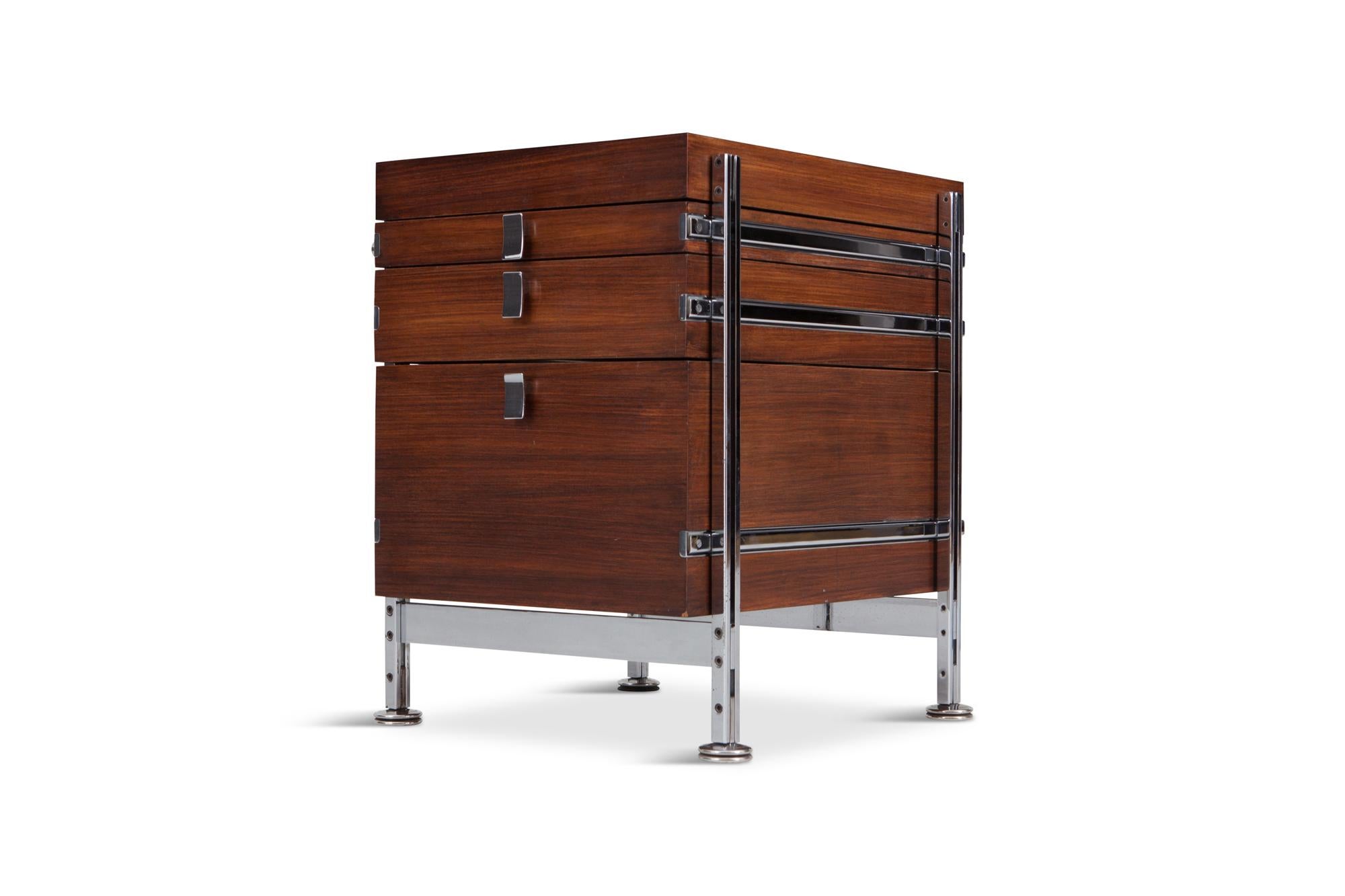 Mobilier Universel,  Jules Wabbes, Belgium, 1960s, 

Jules Wabbes was a famed and accomplished Belgian furniture designer and interior architect. 
Chest of drawers in mahogany, mounted on a stainless steel base. 
A true iconic Belgian design. 
We