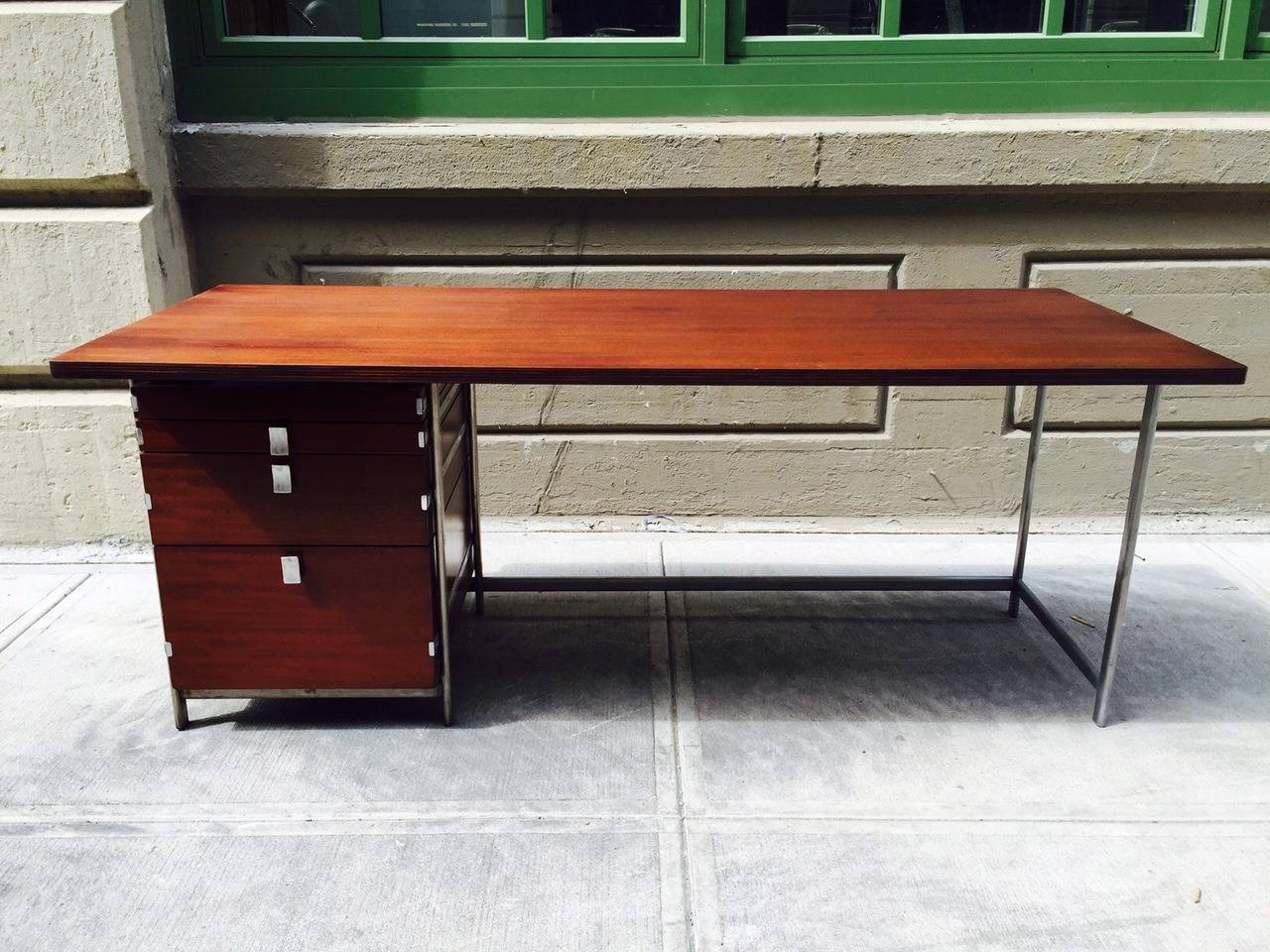 Rosewood and solid chromed steel frame desk by Jules Wabbes, manufactured by Mobilier Universal. Industrial desk. Each handle is marked Wabbes.