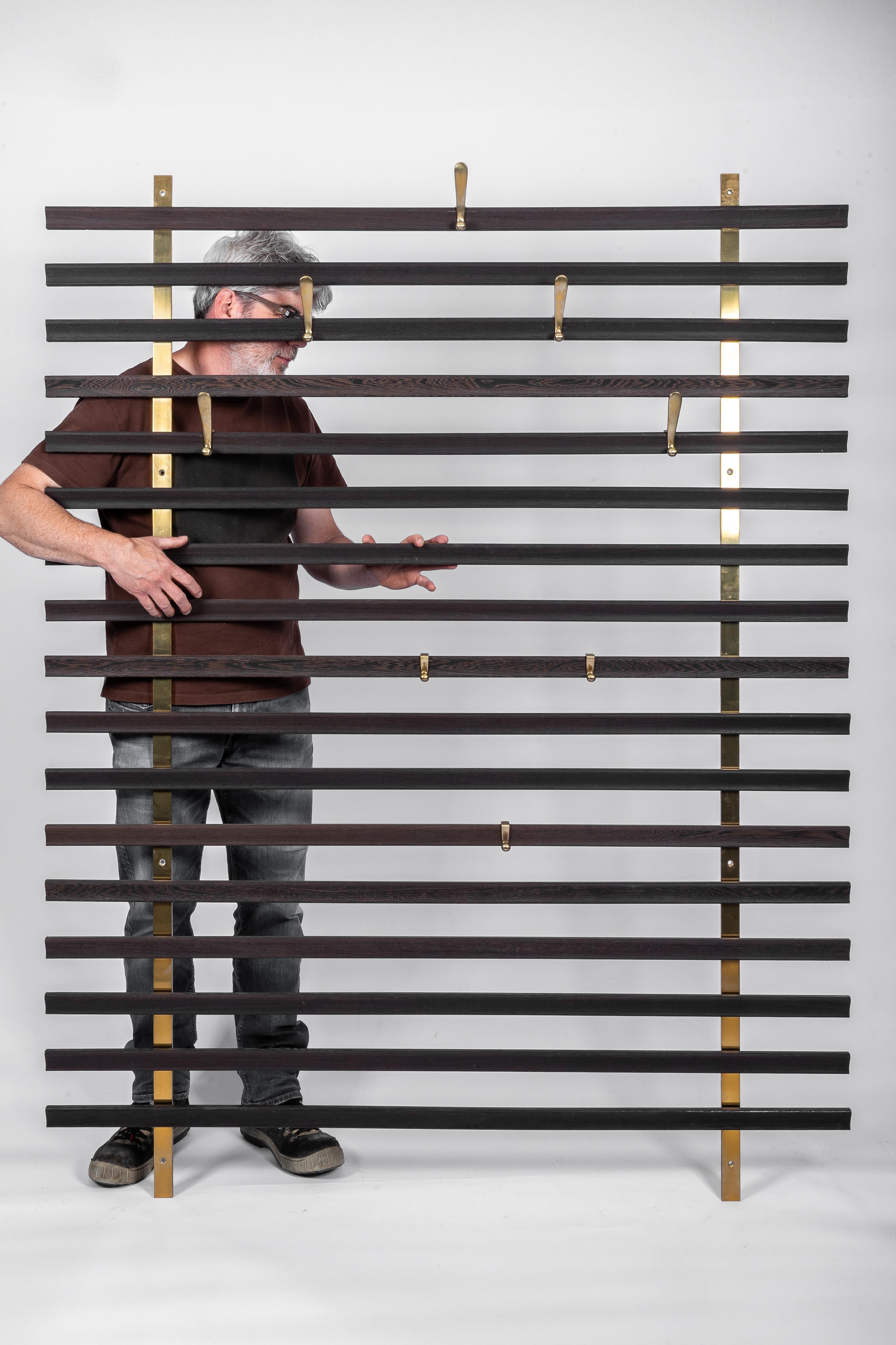 Slatted coat rack by Jules Wabbes.
Her we have a reedition from this iconic coat rack by one of the most famous Belgian designers.

This item dates from 2010.
He was created by BULO a belgian office-furniture company in a honour's to Jules
