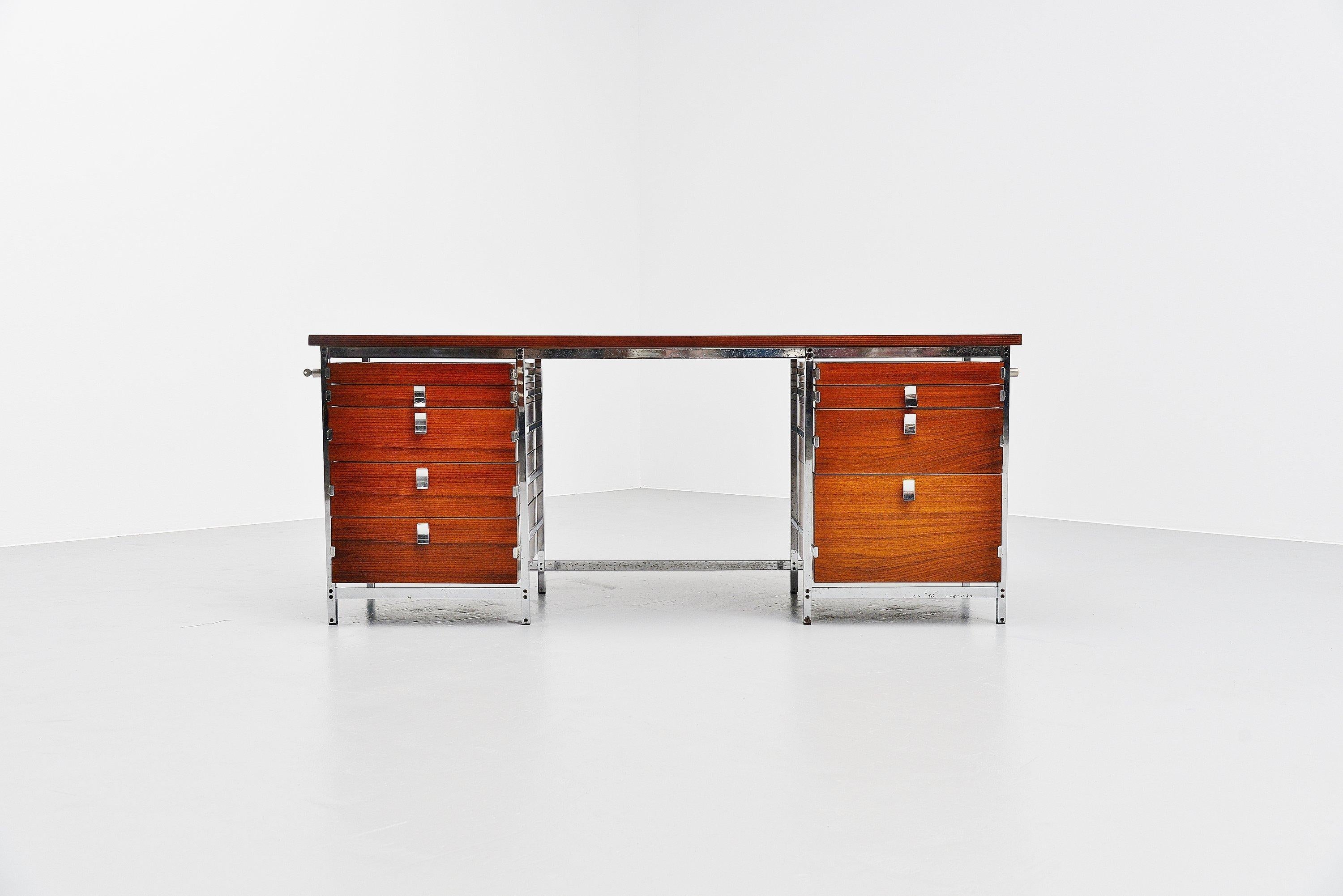 Fantastic architectural desk designed by Jules Wabbes and manufactured by Le Mobilier Universel, Belgium, 1960. This desk has a solid steel frame, chrome-plated. And the wooden parts are veneered with rosewood veneer which has a very nice grain to