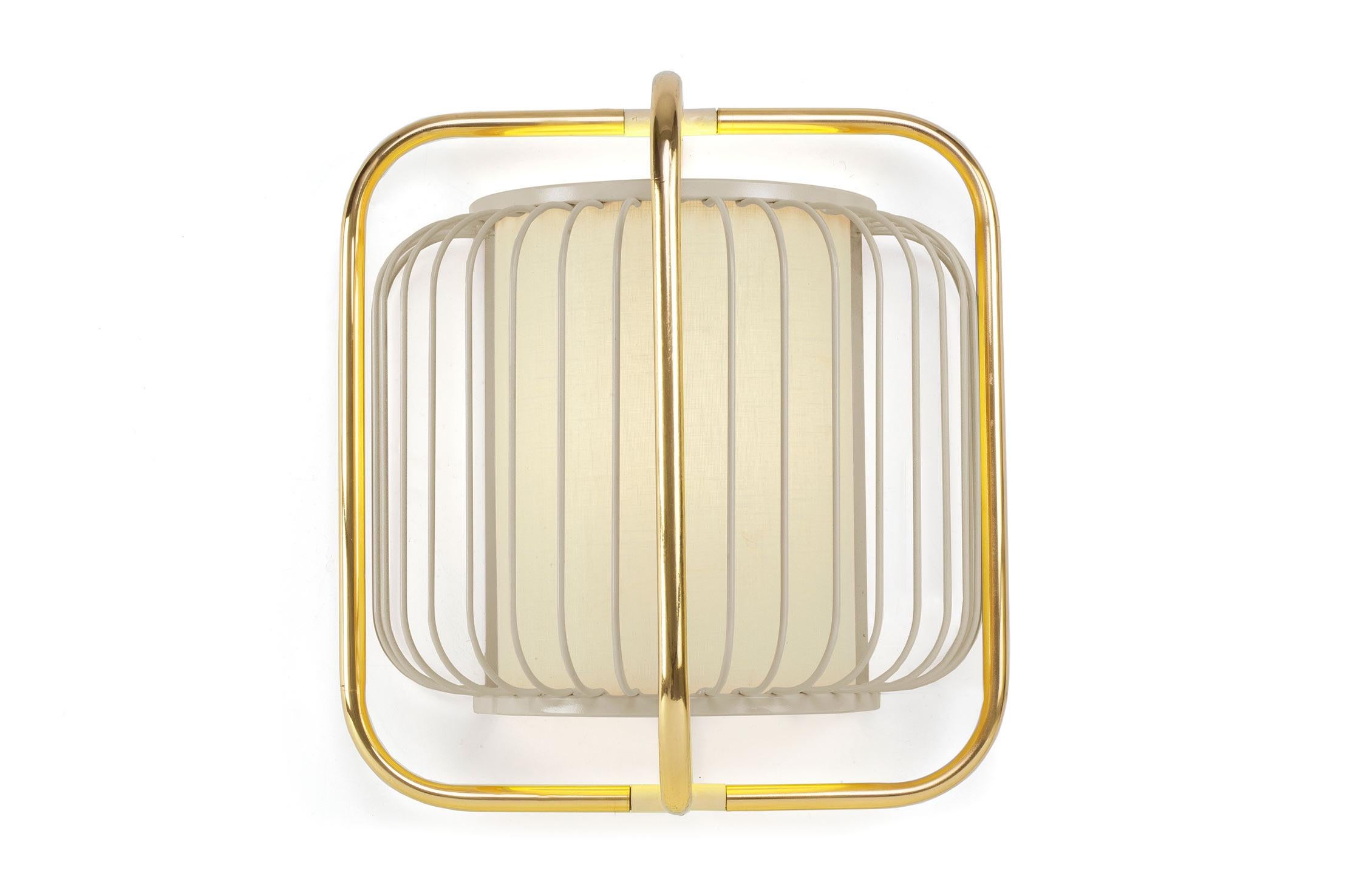 Jules Wall is all about a timeless, effortless sophistication. A perfect combination of polished brass or copper with fun lacquered metal colors and a soft and elegant linen shade enclosed in the structure that softly diffuses the light.
The