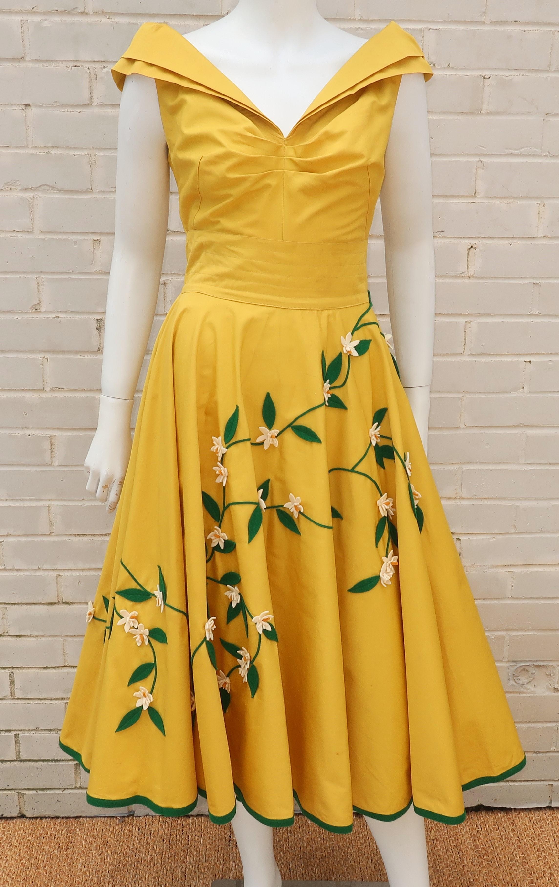 This adorable cotton poplin two piece dress was designed C.1950 by Hollywood actress and entertainer, Juli Lynne Charlot, also known as the inventor of the poodle skirt. Ms. Charlot often designed her own stage wardrobe and during a time in her life