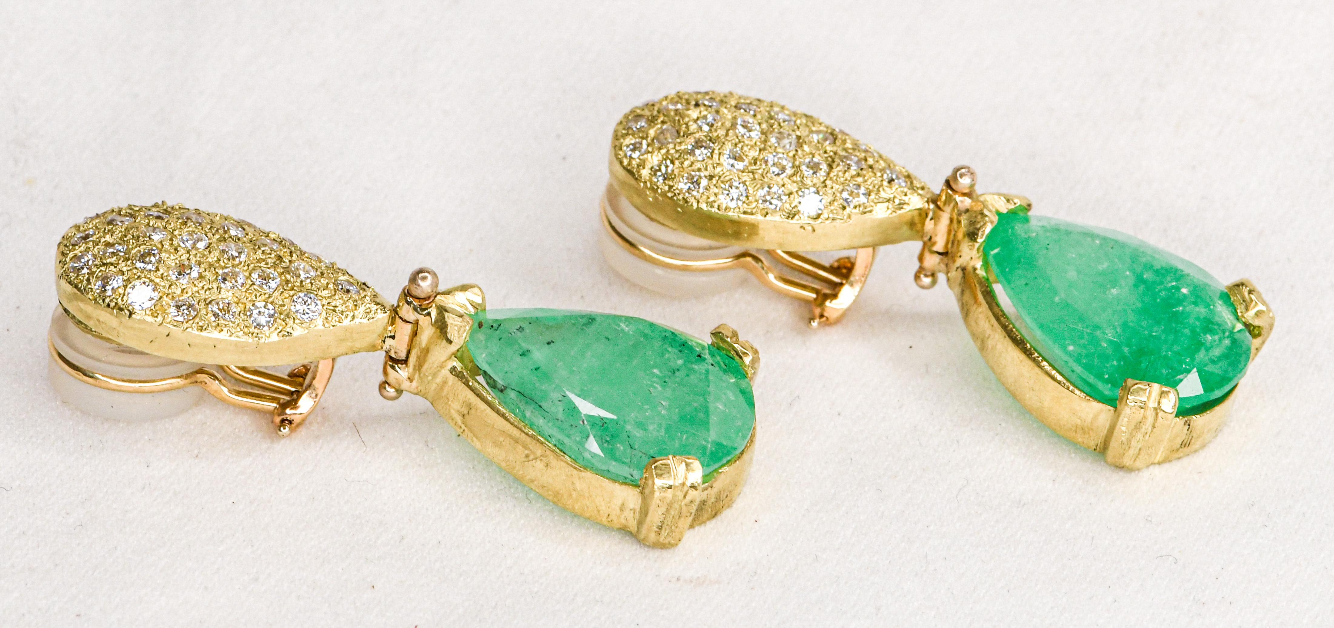 Julia Boss only uses the very best gems in her unforgettable creations.  These drop earrings are no exception!  Set in 18K yellow gold, these provocative, pear shaped Columbian emeralds are perfectly complemented by clipons encrusted with pave