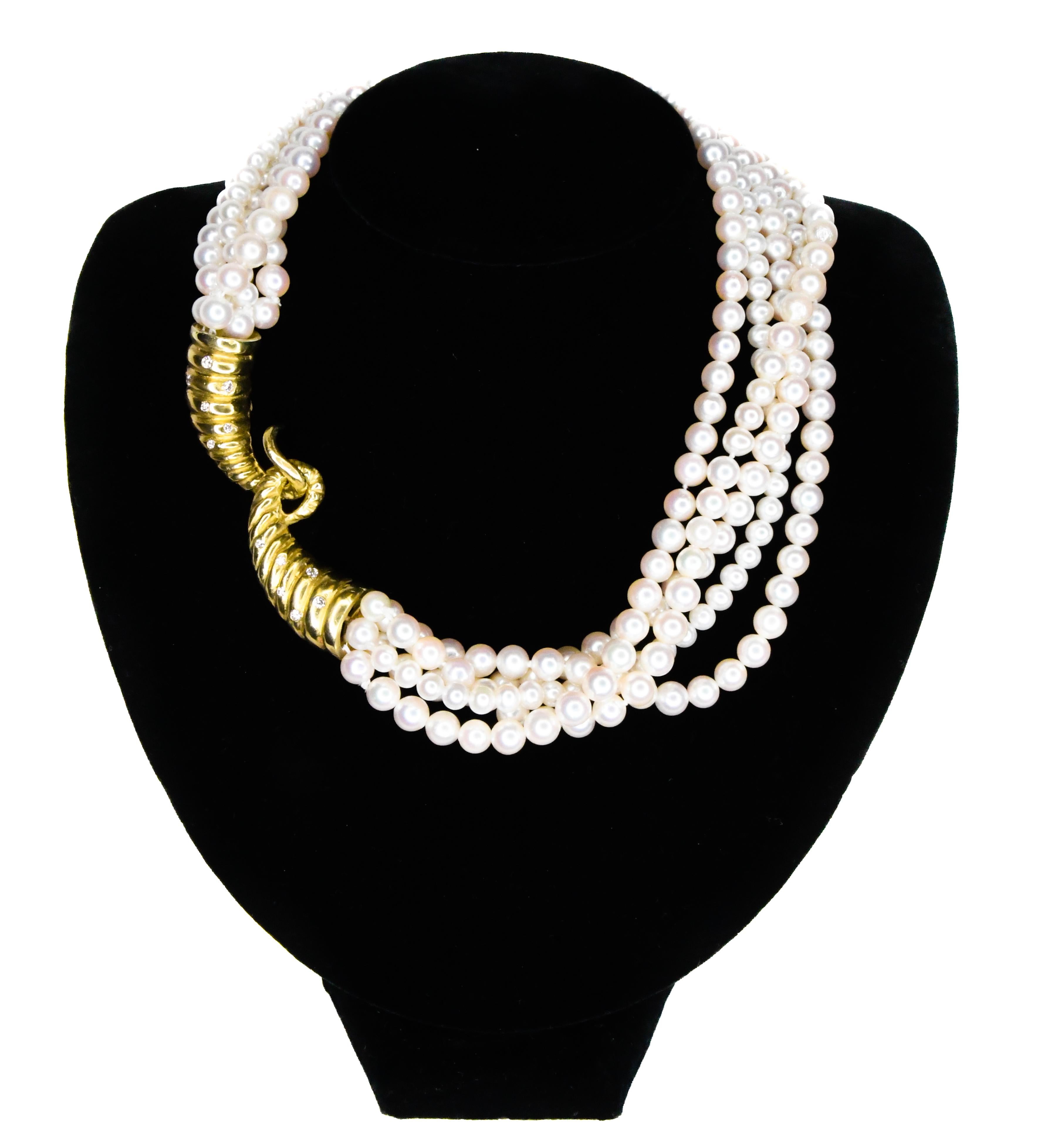 Julia Boss handcrafted multistrand pearl choker necklace is sure to become a coveted heirloom!  Necklace features 5 strands of precious pearls gathered and held together by a 