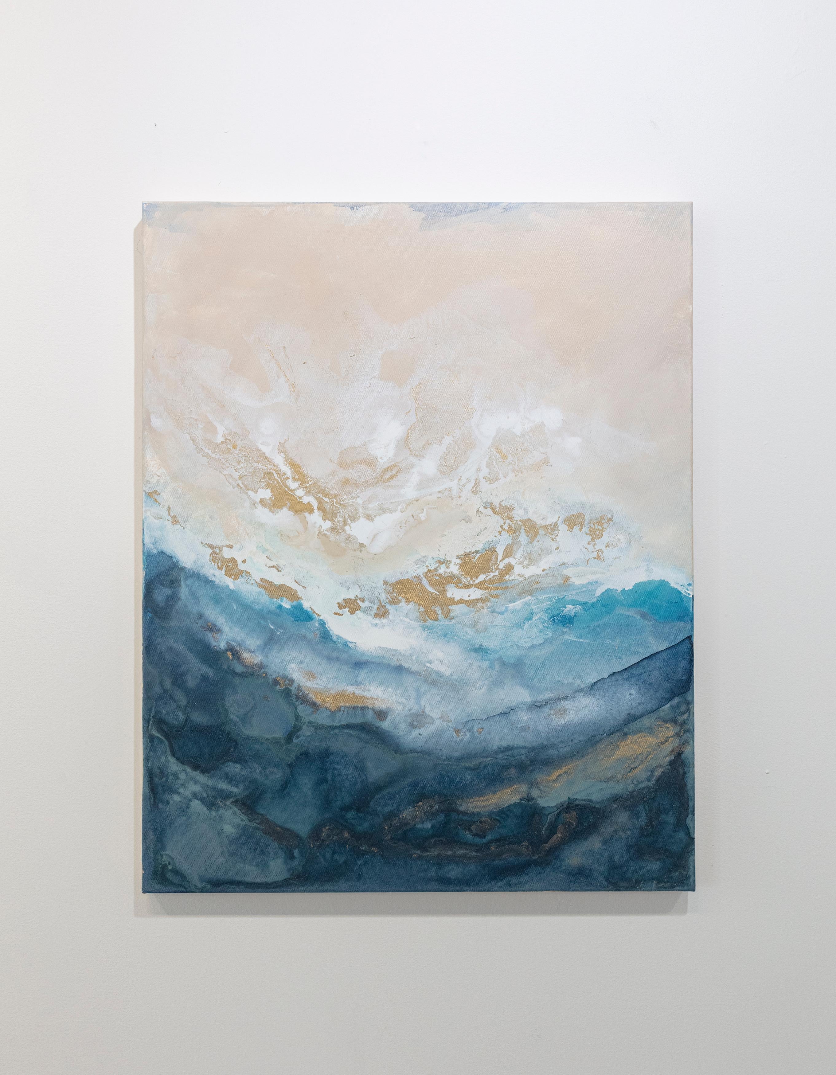 This abstract painting by Julia Contacessi features a light, coastal palette, with washes of varying blue tones on the bottom of the composition and light blush and white tones at the top. Metallic accents are layered through the middle of the