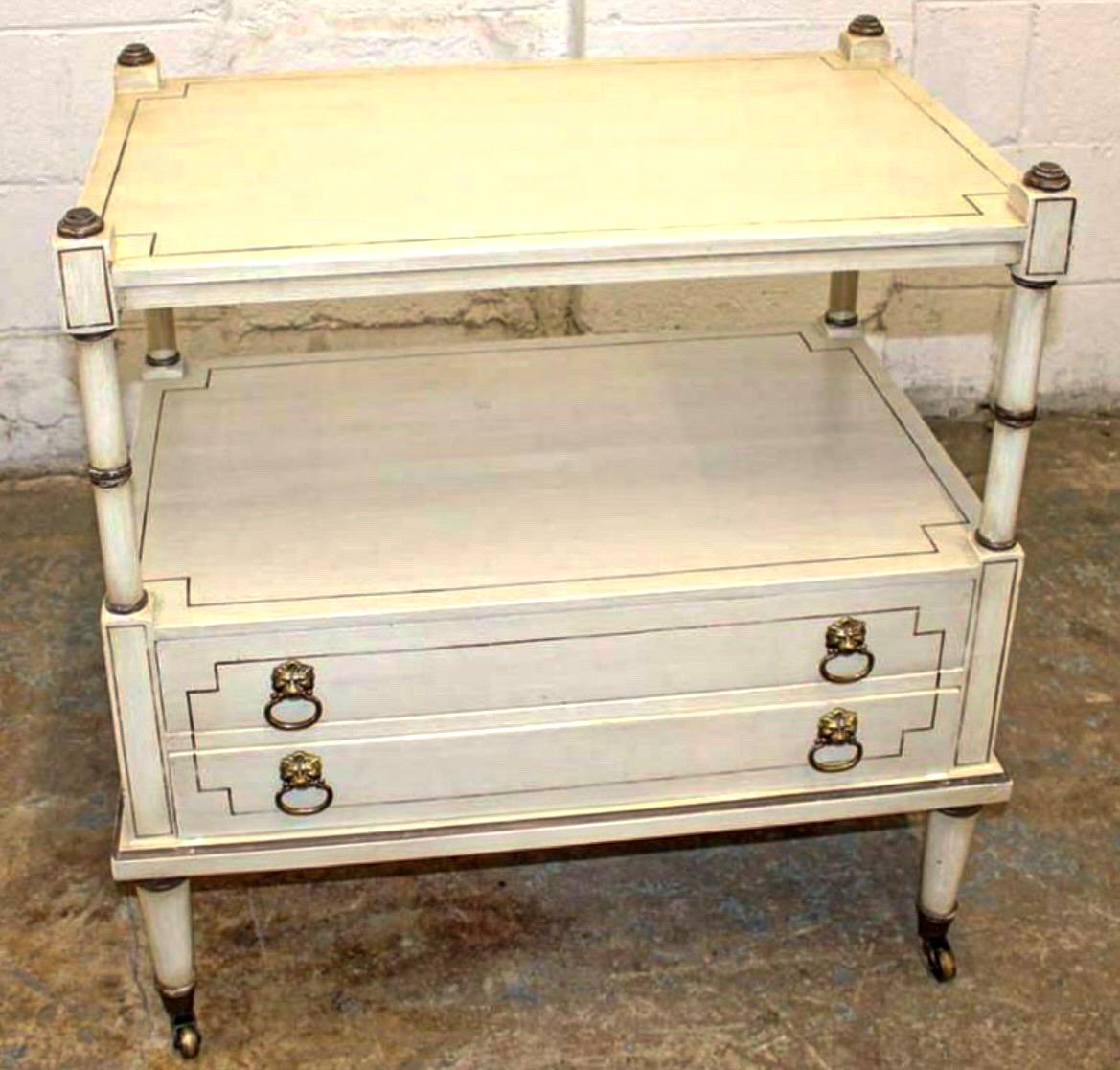 This is a French style two tiered side table designed and manufactured by Julia Gray Ltd of New York. It is marked in the top drawer. It has dovetail construction. 

My shipping is running two to five weeks. Due to ferry constraints, we ship to a