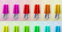 Rainbow Pop - Grid of colorful rainbow summer ice double popsicles in wrappers