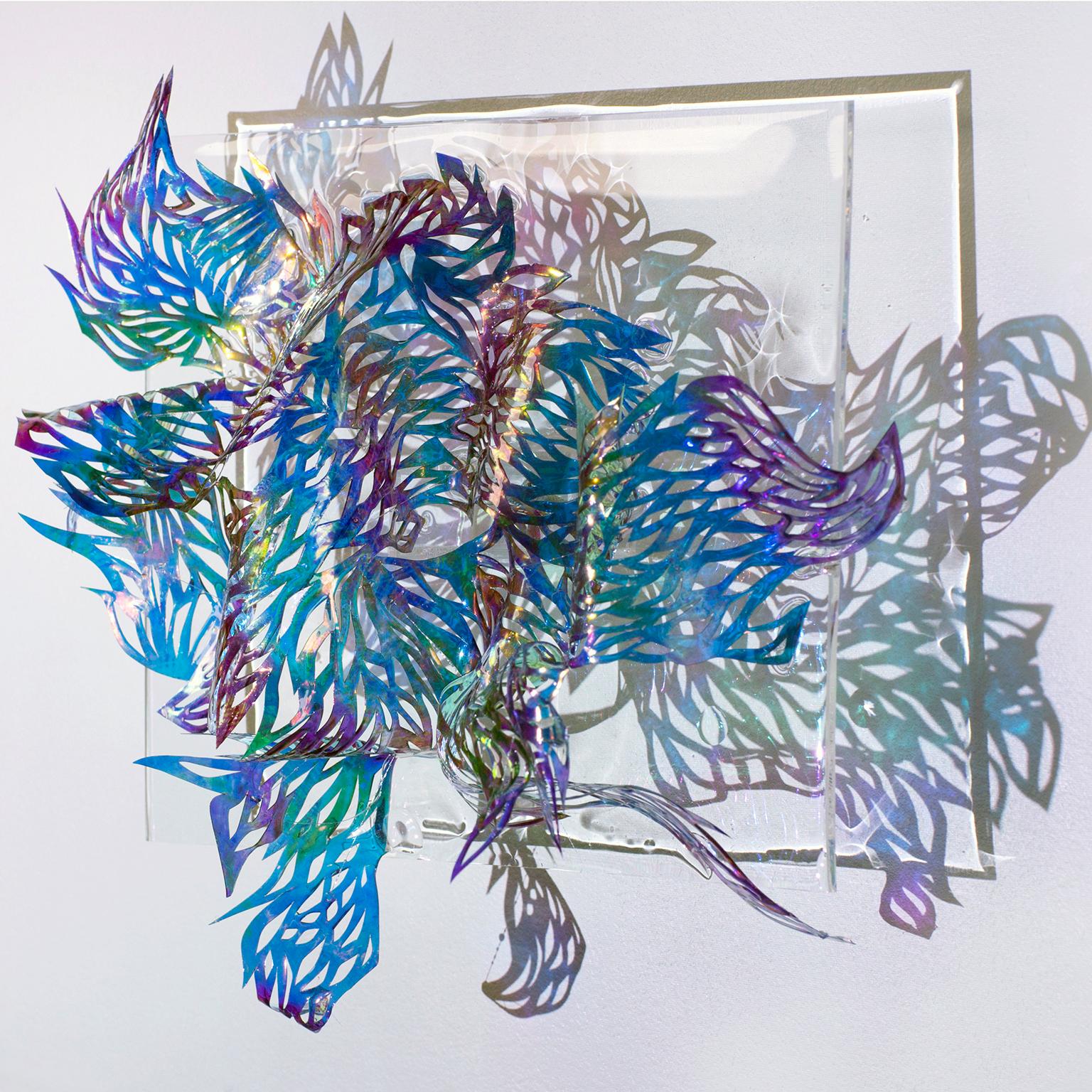 Medium: hand cut vinyl, acrylic, resin

Julia Sinelnikova is an interdisciplinary artist who works with holograms, performance, and digital culture. Her light installations have been exhibited internationally, and she has performed widely as The