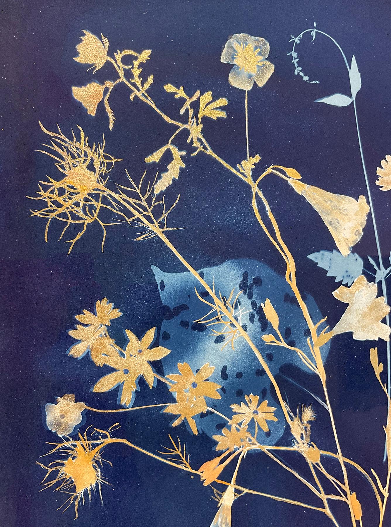 Figurative Still Life painting of gold and pale blue flowers on an indigo cyanotype background 
