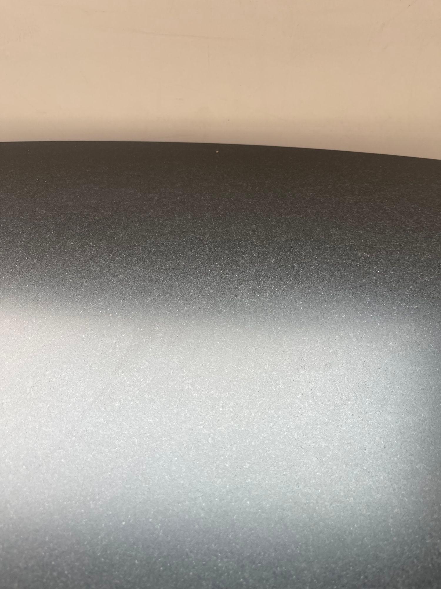 Julian Chichester Dakota Oval Table w/ Metal Base & Marble Top. England, 1990's. In Excellent Condition For Sale In Los Angeles, CA