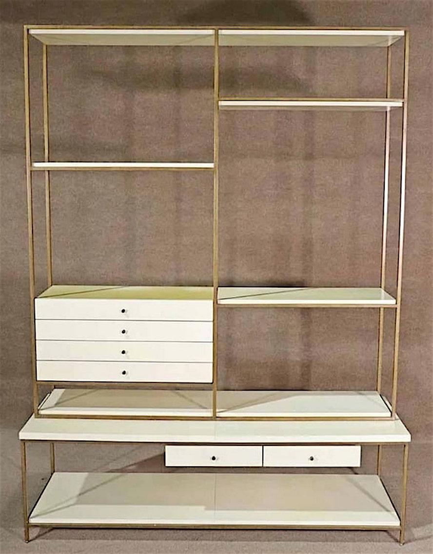 Two piece wall unit designed by Julian Chichester in natural vellum and metal framing. Designed after Paul McCobb's iconic wall unit.
Mid-Century Modern two piece wall unit with shelving storage and drawers. Standing room divider with