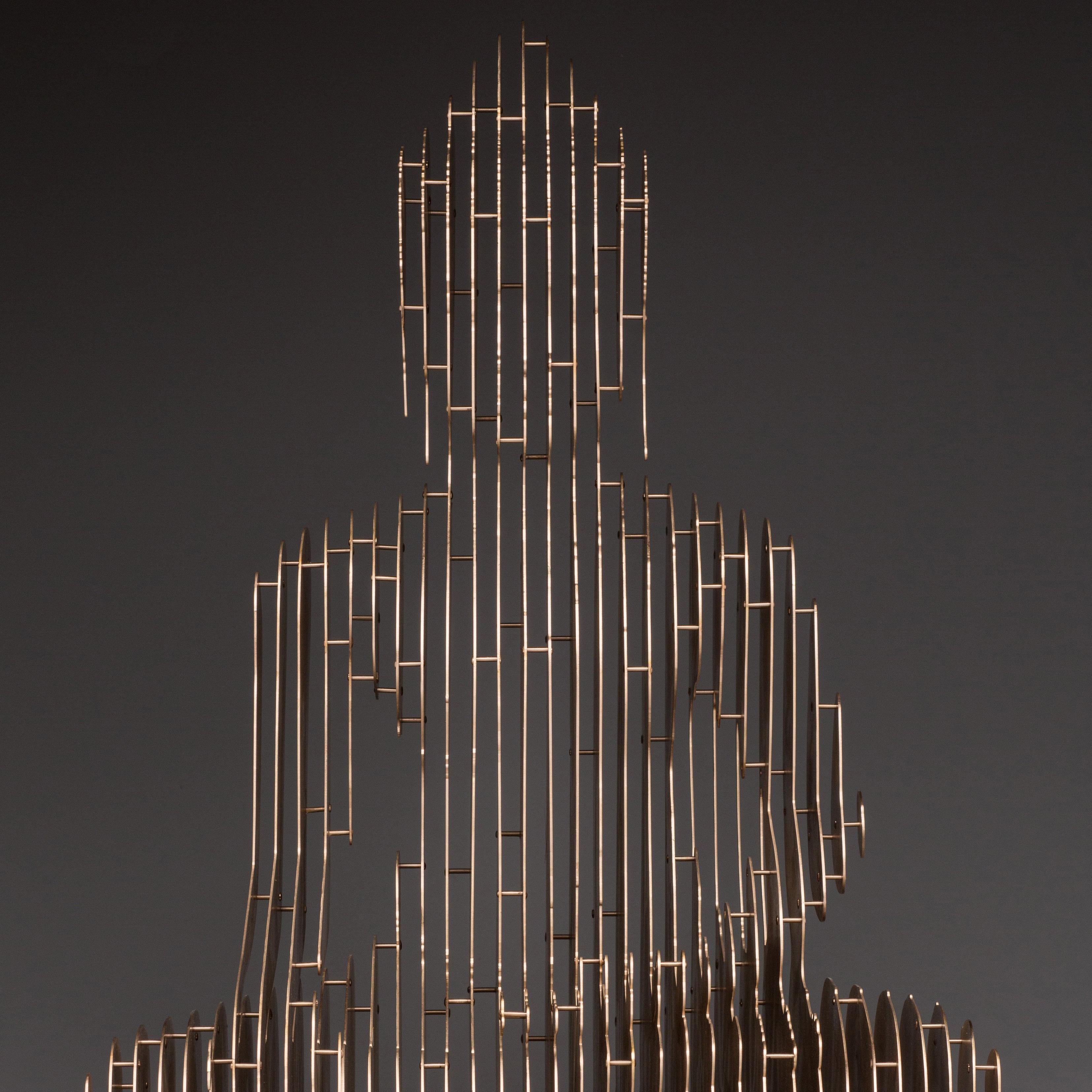 Limited edition of 6
Inspired by quantum physics, the artist’s professional background, Julian Voss-Andreae developed an approach that transforms the human figure into a large number of vertically arranged, parallel steel slices with constant