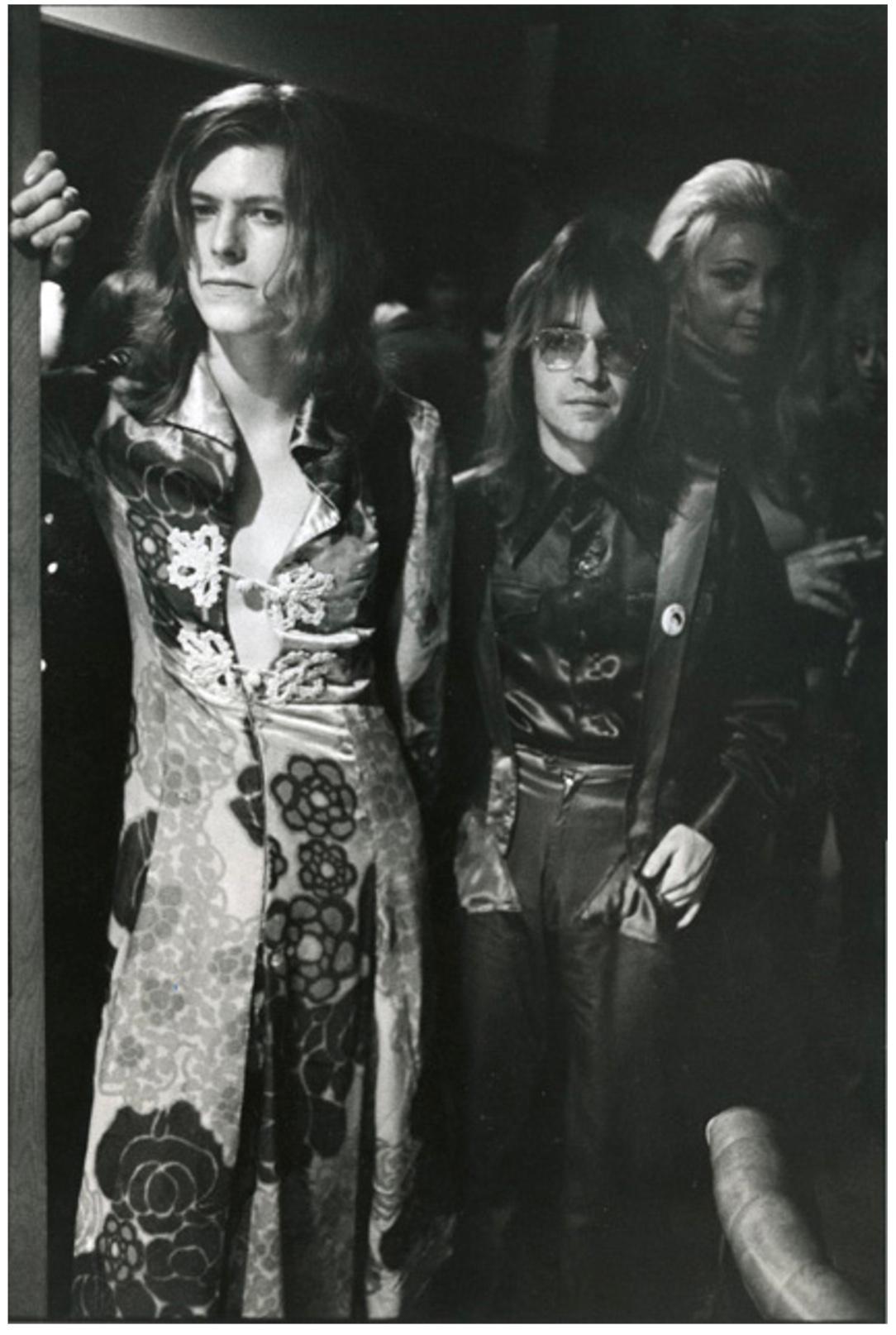 David Bowie and Rodney Bingenheimer, 1972

20" x 16"

Rodney Bingenheimer is credited with bringing the glam-rock phenomenon David Bowie to American audiences. No one in Los Angeles knew who Bowie was at that time.

Artist Bio:

After starting his