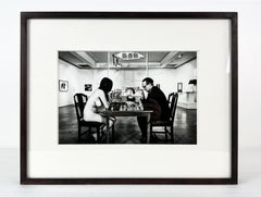 Eve Babitz and Marcel Duchamp playing chess during Duchamp's Pasadena Art Museum