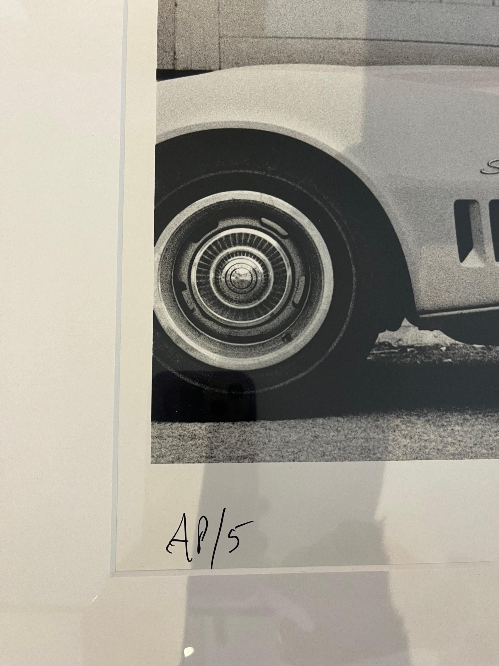 ^Framed^ Joan Didion in front of her Stingray Corvette, 1968 - Edition AP/5 - Contemporary Photograph by Julian Wasser