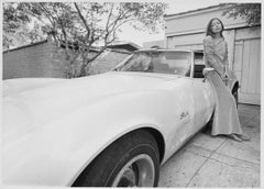 Joan Didion Leaning on Stingray, 1968 Los Angeles