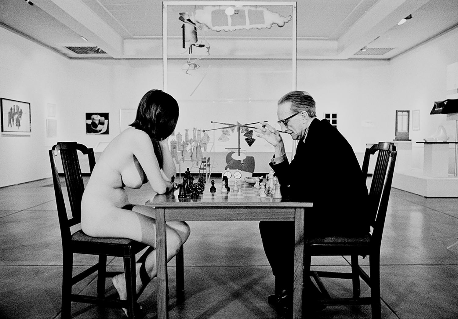 Julian Wasser Color Photograph - Marcel Duchamp And Eve Babitz playing Chess at the Pasadena Art Museum 1963