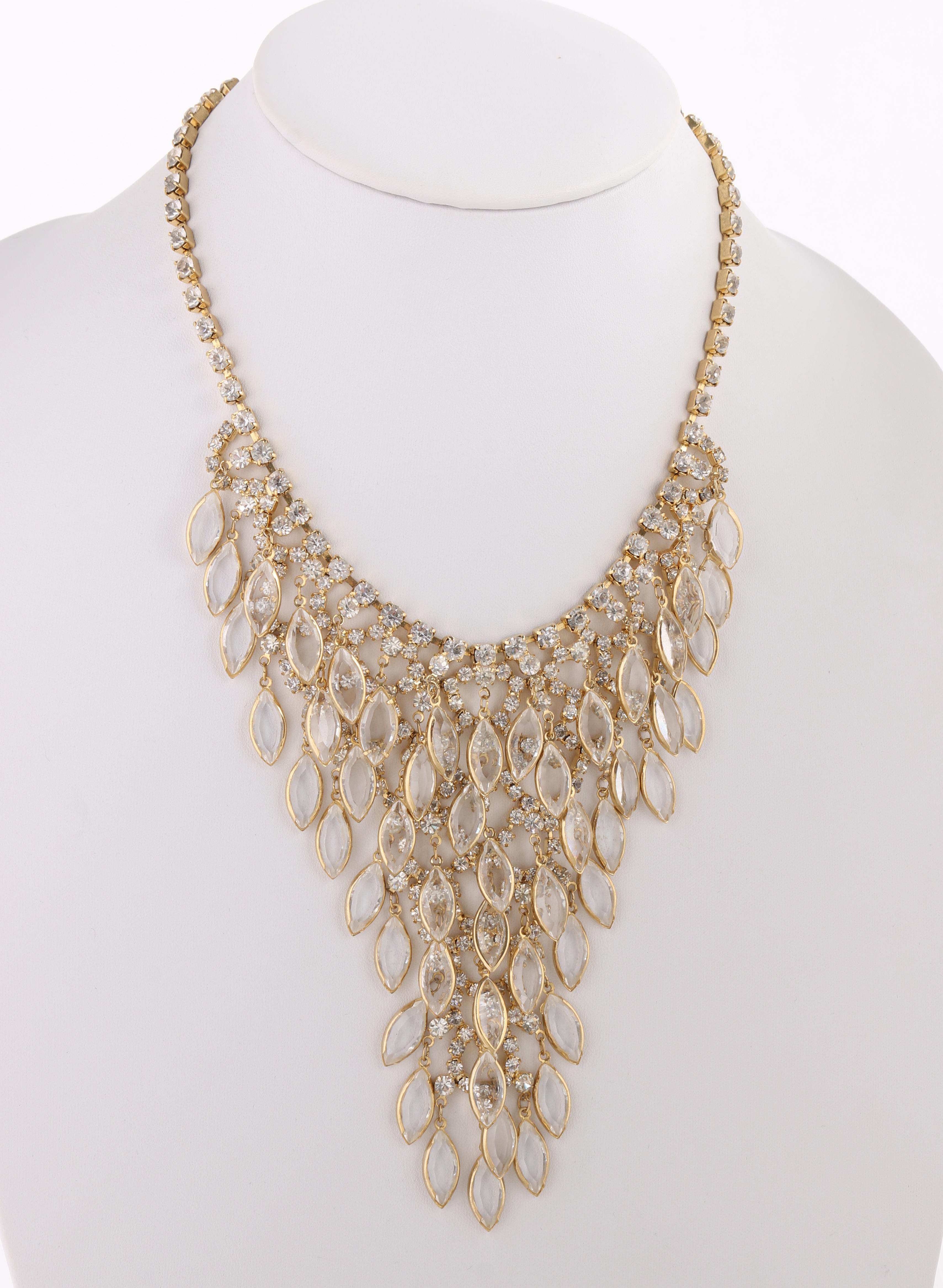DESCRIPTION: JULIANA D&E c.1960's Gold Crystal Rhinestone Waterfall Chandelier Bib Necklace
 
Circa: c.1960’s
Markings: None
Designer: Delizza & Elster
Style: Waterfall bib necklace
Color(s): Gold-toned metal
Marked Material: 
Unmarked Material