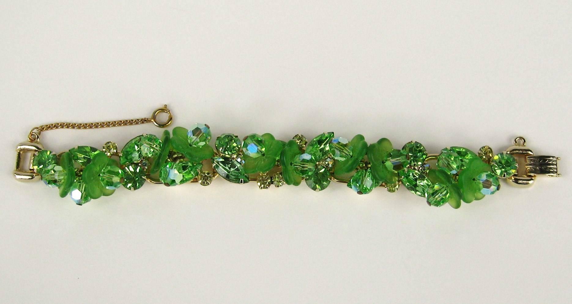 Stunning Juliana Bracelet. This is on the cover of the book Juliana Jewelry Reference Book. The color on this bracelet is amazing. Green Matte and Faceted Beading. Safety chain. Gold-tone hardware. Measuring 7 inches end to end. Fold over clasp.
