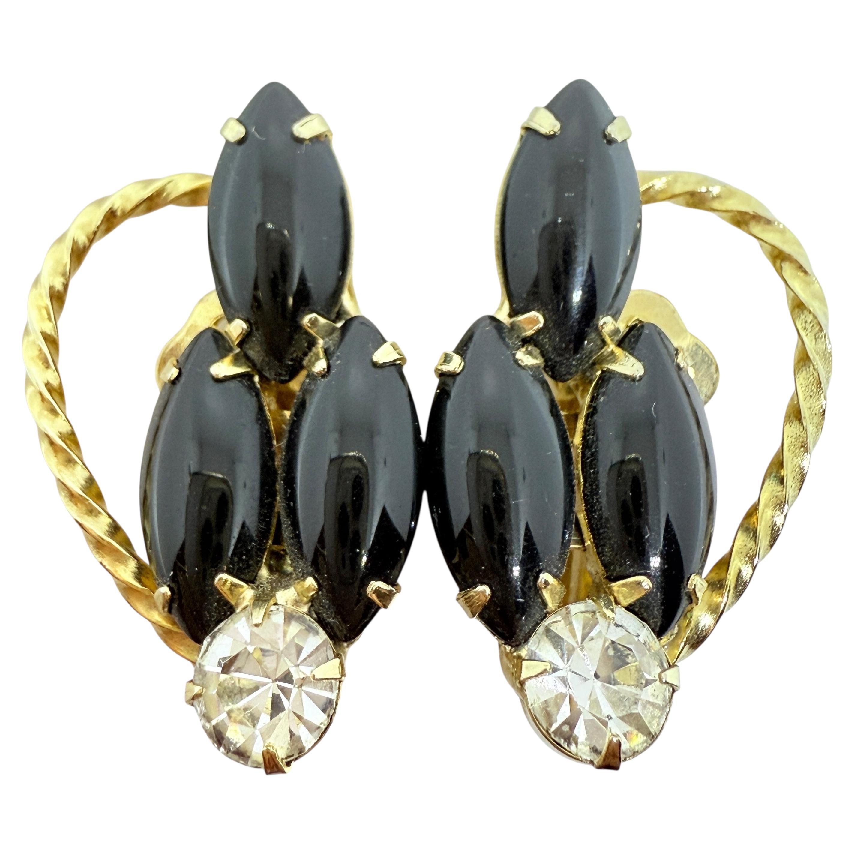 Orecchini a clip di Juliana Delizza
Elster in vetro nero tono oro