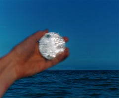 "Placement (Disc)" photograph ocean beach reflection mirror