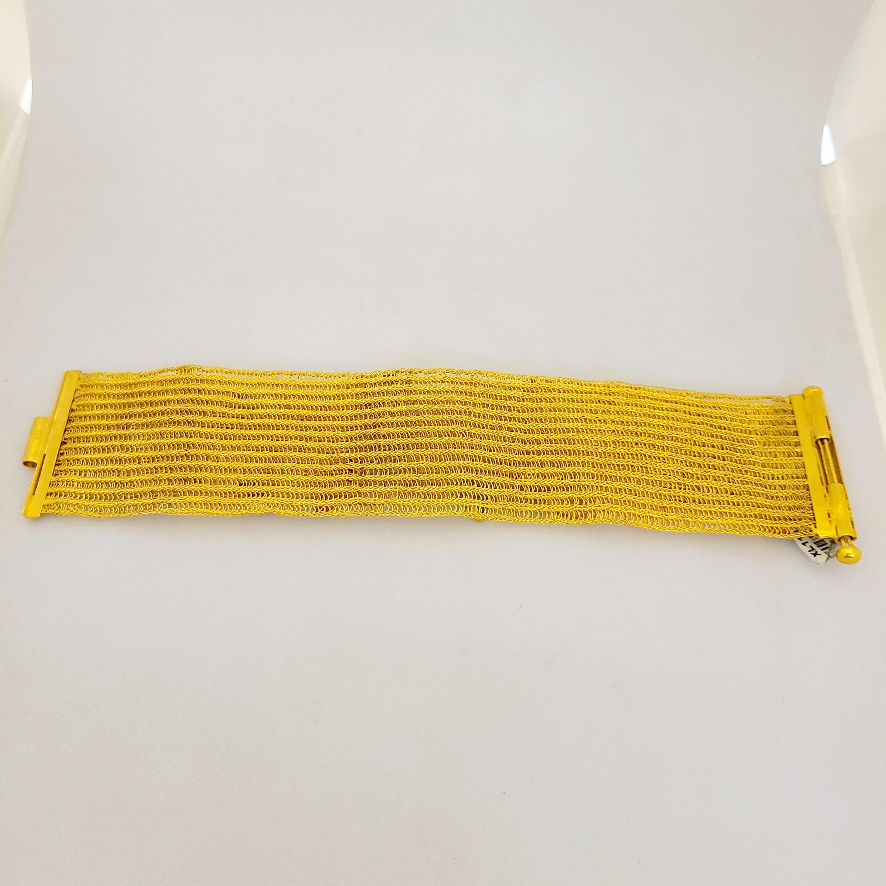 Artisan Julie Baker 18 Karat Yellow Gold Bracelet with 7.00 Carat Marquis Cut Blue Topaz For Sale