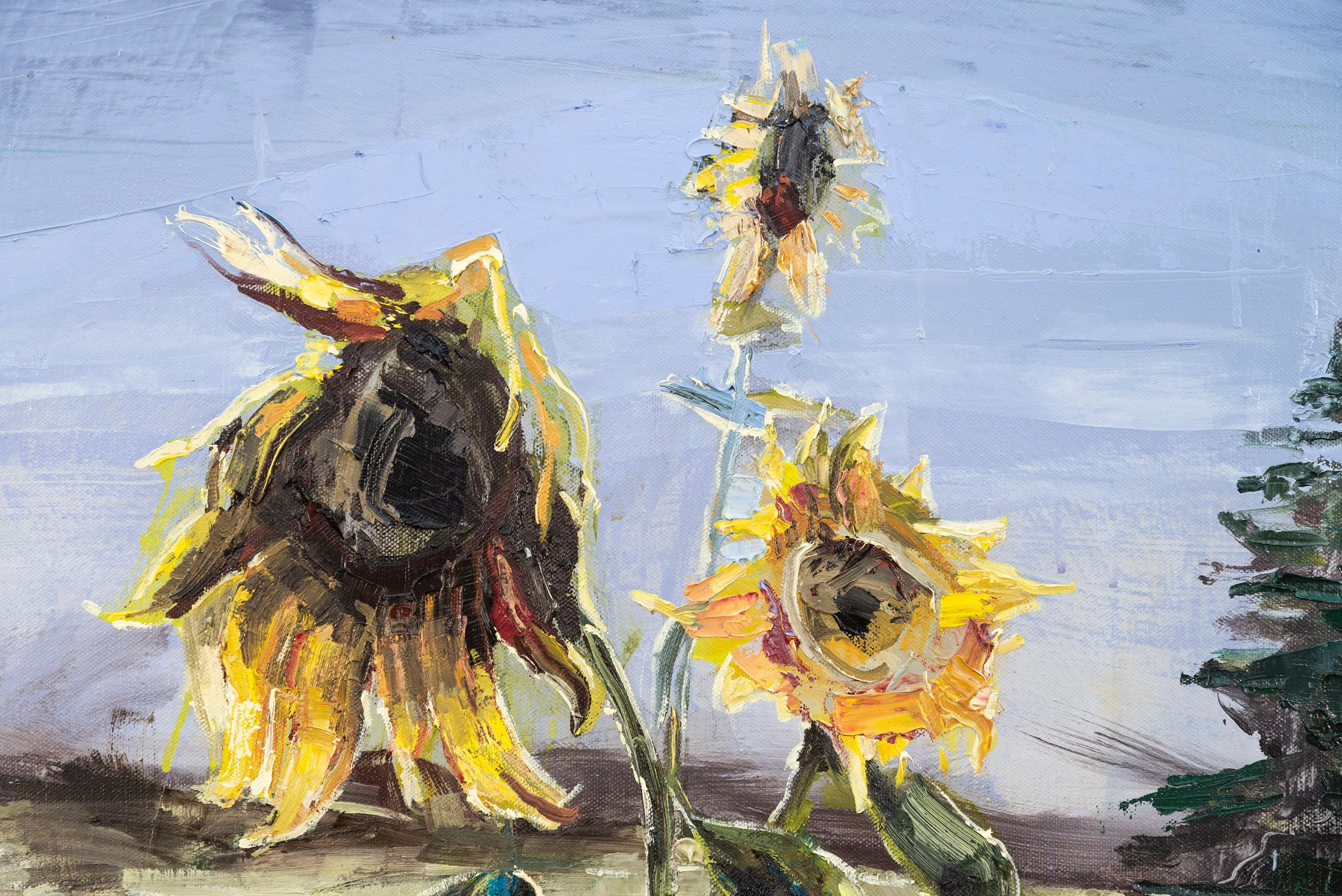 A fading sunflower stands tall in the foreground of this fall landscape by Julie Himel.
The Toronto artist, a devoted environmentalist is known for her colourful abstract paintings of the natural world. This acrylic and oil captures a single wilting
