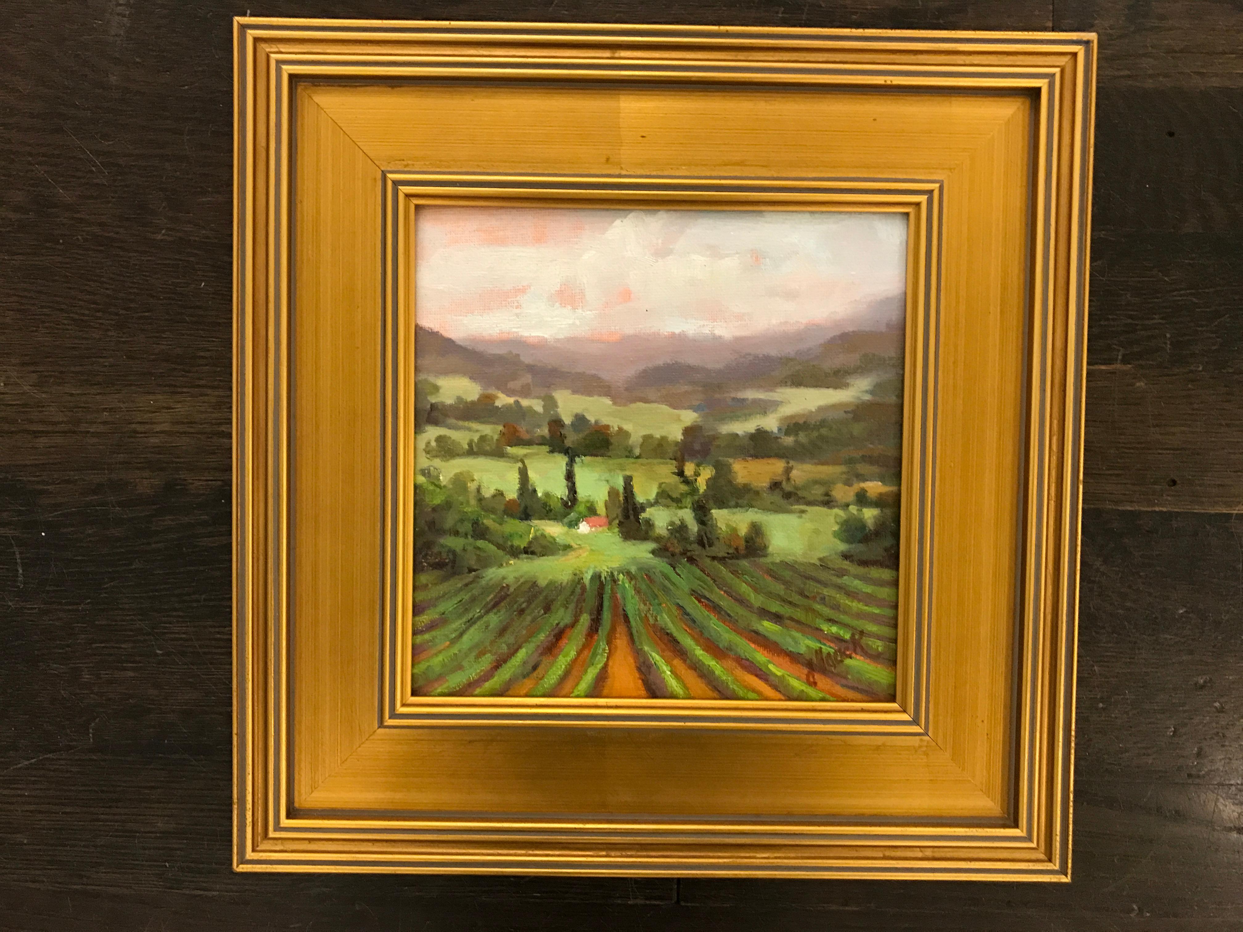 'Fall in the Languedoc' is a small framed Post-Impressionist landscape painting created by American artist Julie Houck in 2018. Featuring a lovely palette mostly made of green and brown tones, this square format is a serene depiction of one of the