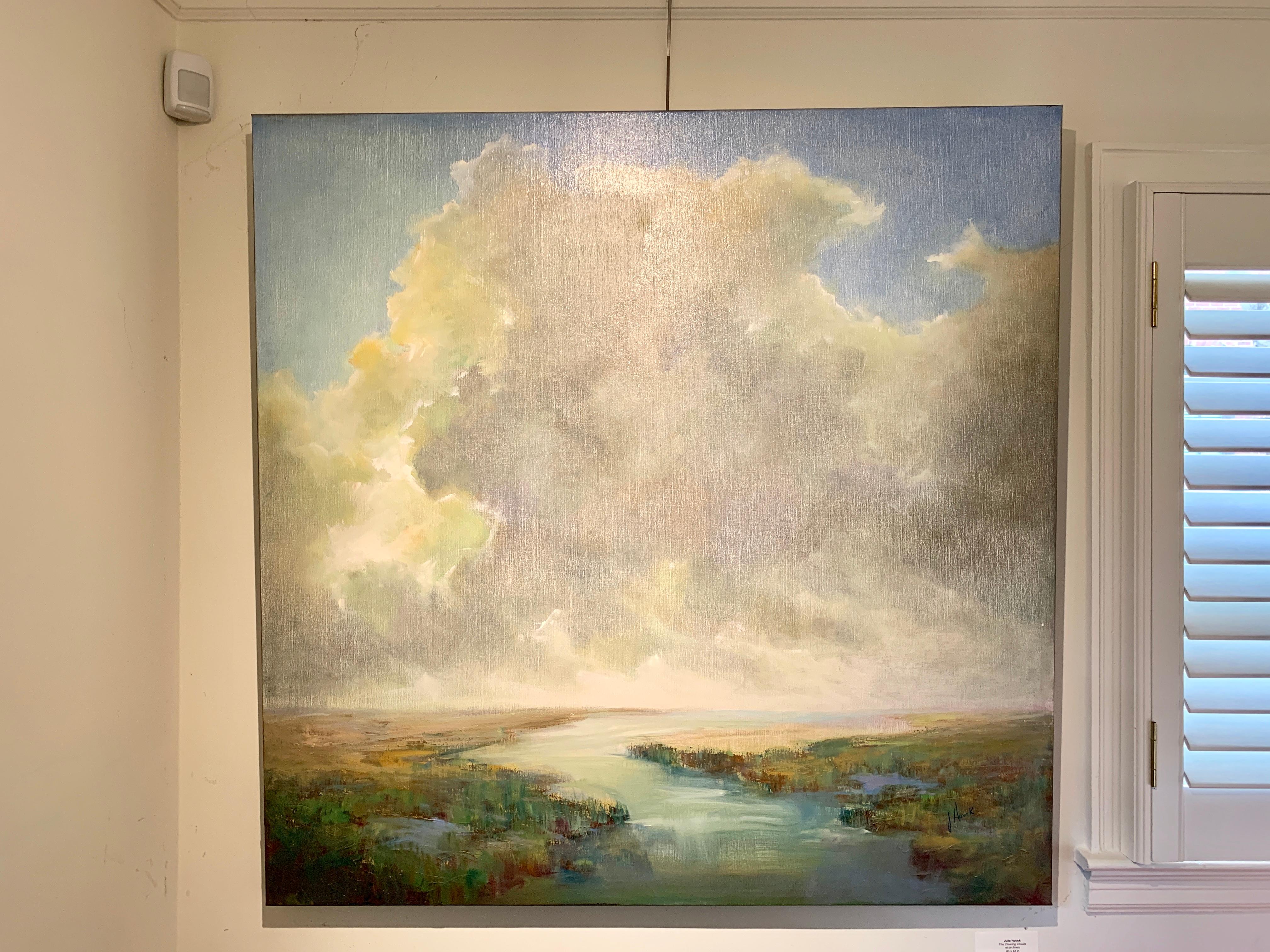 'The Clearing Clouds' is a large Post-Impressionist oil on linen landscape painting of square format created by American artist Julie Houck in 2019. Featuring a luminous palette mostly made of blue, green, grey, soft yellow and white tones, the